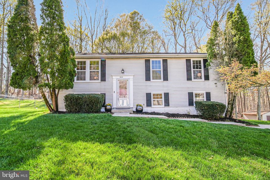 Welcome to The Marlboro Meadows Retreat—a beautifully updated 4-bedroom, 2.5-bath split-level home tucked away on a quiet cul-de-sac in Upper Marlboro. Set on a 0.26-acre lot, The Marlboro Meadows Retreat offers a spacious and functional layout. The main level features warm hardwood flooring in the main living areas, a large living room, and a dedicated dining area that opens to the kitchen—great for everyday living and entertaining. Three bedrooms are located on the main level, including a primary suite with a fully remodeled en-suite bathroom. A second full bath in the hallway has also been recently renovated.

Downstairs, the walkout lower level includes a bright family room with sliding glass doors to the backyard, a fourth bedroom, a half bath, and a bonus flex room perfect for an office or playroom. Step outside to enjoy the back deck and generous yard space, which backs to a peaceful wooded area and includes a convenient storage shed. With updated bathrooms, multiple living areas, and a flexible floor plan, this home is move-in ready and offers room to grow.
