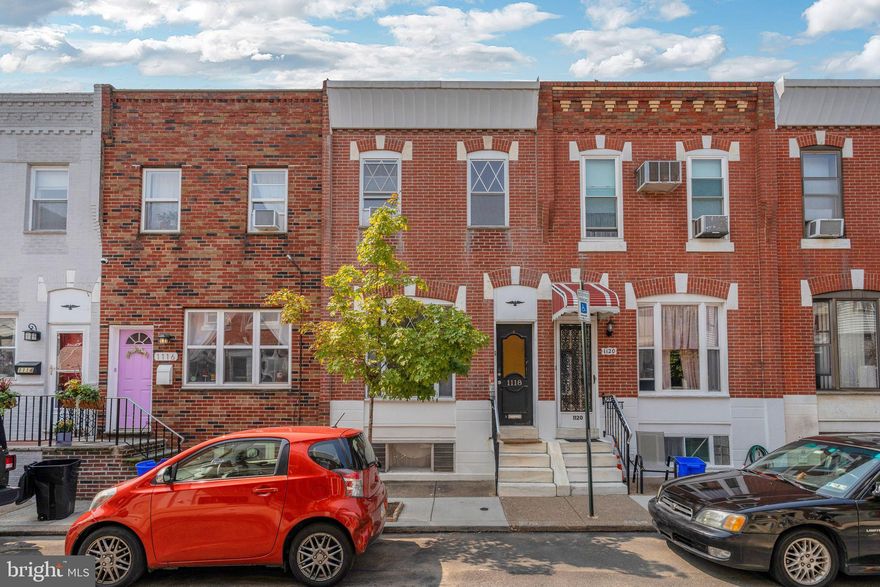 Short walk to Passyunk Ave! This 2 bedroom, 1.5 bath South Philadelphia row home is on a quiet, family-oriented street.  Hardwood floors throughout, updated kitchen with granite countertops, stainless steal appliances, and tumbled marble backsplash. Semi-finished basement with recessed lighting and washer/dryer.  Small hard-scape (low maintenance!) back yard. The upstairs bath has a wood/granite vanity with wood-look ceramic tile flooring.  Walking distance to Passyunk Square, BOK Bar, stadiums, and all public transportation for easy access to Center City.
