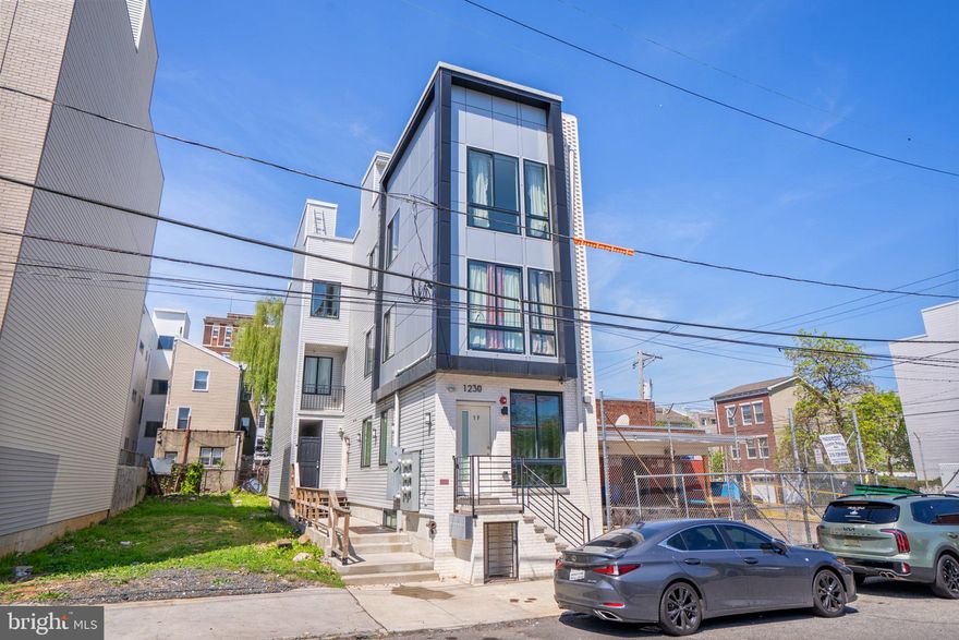 Philly CRE is pleased to present 1230 N Marshall Street, a newly constructed, fully occupied six-unit multifamily asset in the heart of Olde Kensington, just steps from Girard Avenue and moments from Fishtown and Northern Liberties. Built in 2024, this boutique property offers investors a rare opportunity to acquire a stabilized, low-maintenance asset with high in-place income and long-term appreciation potential in one of Philadelphia’s fastest-growing corridors. The property is ideally positioned within walking distance to Girard Station on the Market-Frankford Line and surrounded by multiple SEPTA bus routes along Girard Avenue, providing seamless access to Center City, University City, and beyond. Residents benefit from a highly walkable location with immediate access to the vibrant dining, retail, and nightlife scenes of Olde Kensington, Fishtown, and Northern Liberties, driving consistent rental demand from young professionals. The unit mix includes two studio units, three one-bedroom units, and one one-bedroom plus den unit, all thoughtfully designed with modern layouts that maximize efficiency and tenant appeal. The building is fully leased to PHA tenants, offering reliable, government-backed income while minimizing vacancy and collection risk. Constructed with high-end finishes throughout, each unit features modern kitchens, updated bathrooms, and well-proportioned layouts tailored to today’s renter. All units are separately metered and equipped with individual mechanical systems, allowing for streamlined management and reduced landlord expenses, and each unit includes an in-unit washer and dryer to further enhance tenant convenience and retention. Further strengthening the investment profile, the property benefits from a full ten-year tax abatement with approximately eight years remaining, significantly reducing operating expenses and boosting overall returns. At the current asking price of $1,400,000, the asset delivers a 6.89 percent cap rate, 4.23 percent cash on cash return, and a DSCR of 1.18 based on in place income, with an NOI of $96,517 and projected annual cash flow after debt of $14,794, positioning investors for immediate yield with additional upside as rents continue to grow in this evolving submarket. Located within a Qualified Opportunity Zone, 1230 N Marshall Street may also provide additional tax advantages for investors focused on long-term wealth creation. As an added incentive, the offering includes one year of free property management, providing immediate operational support and increased net income for investors. Take advantage of this exceptional opportunity to secure a turnkey, high-yielding investment with built-in management support and long-term growth potential.