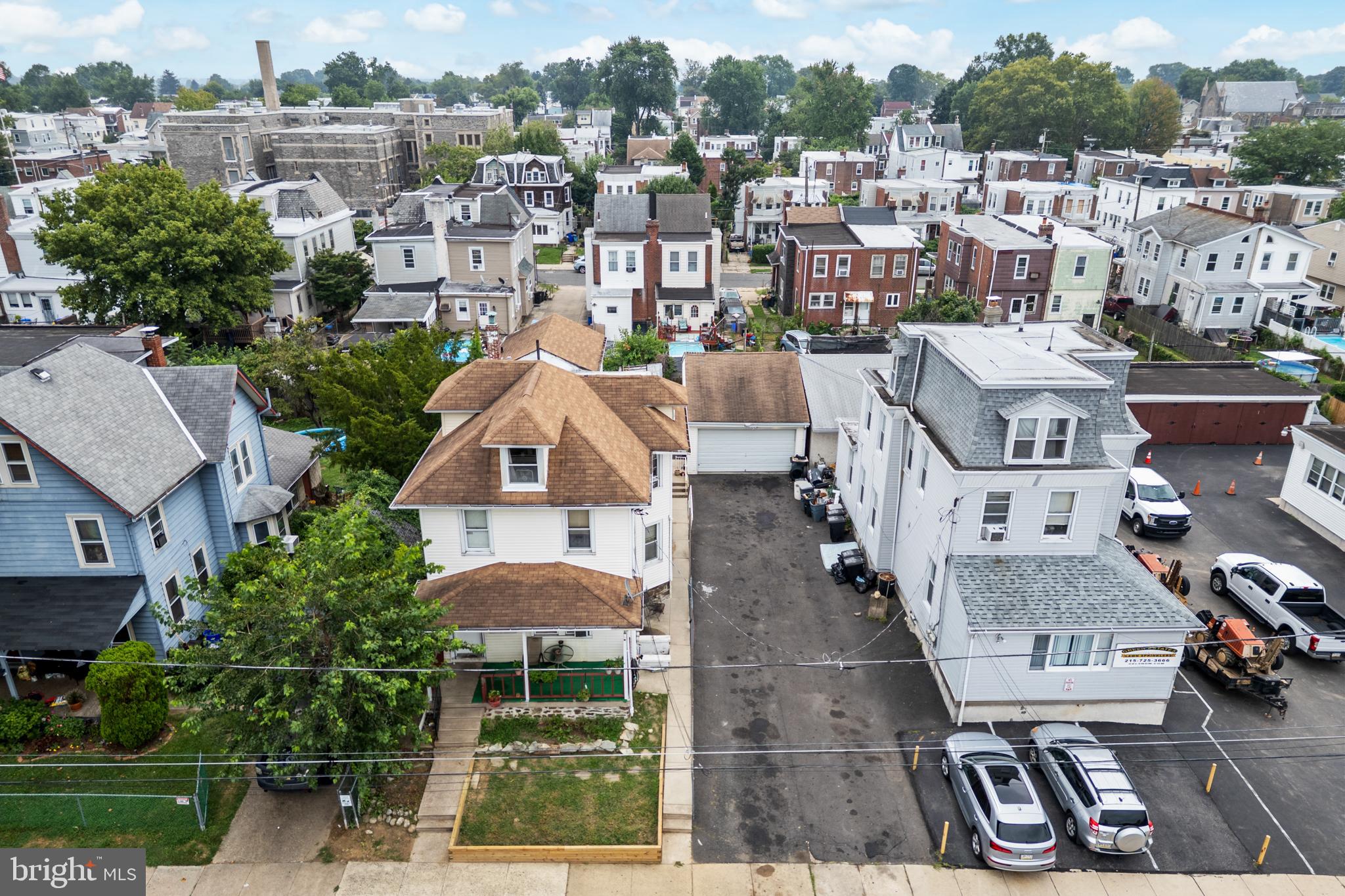 Business Owner’s Dream! Nestled at the famous 5-Points intersection of NE Philly's, conveniently located, Burholme, neighborhood, where you are just a short drive to the Suburbs, Route-1, the Rising Sun Avenue shopping district, and so much more! This Single-Detached, Mixed Use property has so much to offer and so much potential. Plenty of parking in the multi-car driveway with additional space in the warehouse style 2-car detached Garage, currently rented for $500/m. Run your business from the office space, located in the lower level of the main building. which offers a full bathroom, a faux fireplace, and plenty of interior space, or rent this space out for potentially $1,800/m. The apartments upstairs offer plenty of income growth as they are all currently rented below market rent at $975/m each, beginning with the rear entrance unit, offering a spacious Living room, eat-in Kitchen with electric cooking, a spacious Bedroom, and a 3pc Bathroom. The main front entrance offers a common area foyer with access to the main level unit, offering a Living room, full Kitchen with gas range/oven, 2 spacious Bedrooms, and a 3pc Bathroom. The 2nd floor unit, offers a Living room, Living room, 2 Bedrooms, a 3pc Bathroom, and an eat-in Kitchen with gas cooking, along with access to the walk-up attic space. For recreation, relax on the cement patio or the rear grass yard, and there's also a storage shed for your convenience. This is a great opportunity for you to just collect rents, live in one unit and collect rents, or live in one unit, run your business from the office, and collect rents! Please take a minute to view the Video Tour and then schedule your in-person showing appointment, today!