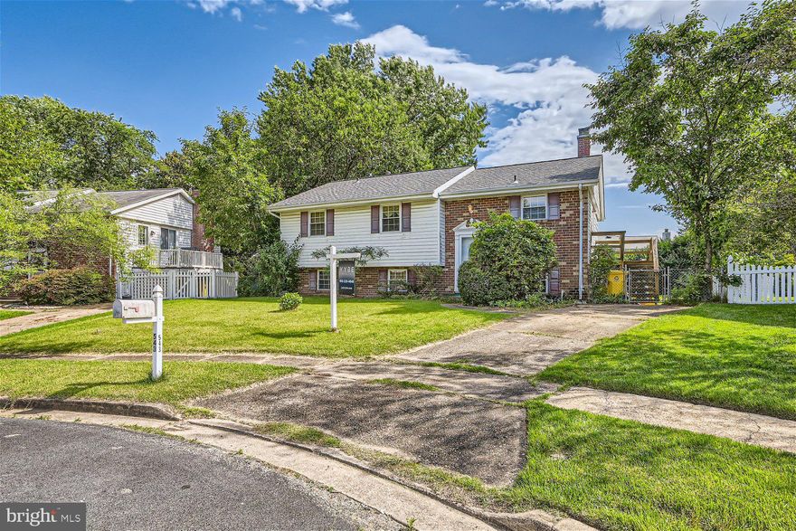 Expansive 3BR/2BA split foyer home located on a sprawling lot in a quiet neighborhood.  Pull into the driveway, make your way past adult landscaping, and open the door into your forever home.  The main floor offers tons of natural light, an open concept living room, dining room, and eat-in kitchen. The kitchen offers plenty of cabinets, a sink under a window, a pass through into the dining room, ideal when hosting family events, and a space for a breakfast table.  Down the hall are two sizable secondary bedrooms, a large primary bedroom, and a full bath.  The lower level features a vast family room with a wood burning fireplace surrounded by a brick wall, laundry room, storage, a full bath with walk-in shower, and  a sliding door to an amazing fenced yard space.  From the kitchen step out onto a wood deck that overlooks the abundance of green space in the yard that is filled with possibilities.  This home is ideal for any new homeowner and has so much to offer including being located on a quiet cul-de-sac and within close proximity to shopping, restaurants, and commuter routes.  
Seller prefers Front Porch Title. Roof new as of 4/12/21, HVAC new as of 10/14/2013
