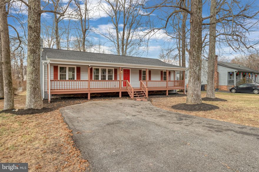 Immaculate Renovation of 3 Br 2 Ba Single Family Home*New Kitchen Includes: New White Cabinets, New Stainless Steel Appliances, New Quartz Countertops, Center Island*All New Baths*New Luxury Vinyl Flooring and New Carpet Bedrooms*New Roof with Architectural Shingles*New HVAC*New Windows*New Recessed Lighting*Front Porch the Length of the Home*Wood Burning Fireplace*New Interior Doors, Trim and Hardware*Fresh Paint Inside & Outside*Large Level .31 Acre Lot*Aquia Harbour Amenities include: Country Club and Golf Course*Pools*Gated Community*Marina & Kayak Canoe Launch*Community Center*Multiple Parks & Recreation*Stables*Walking Trails and much more!  Close to I95, Route 1, Shopping, Restaurants and Quantico!