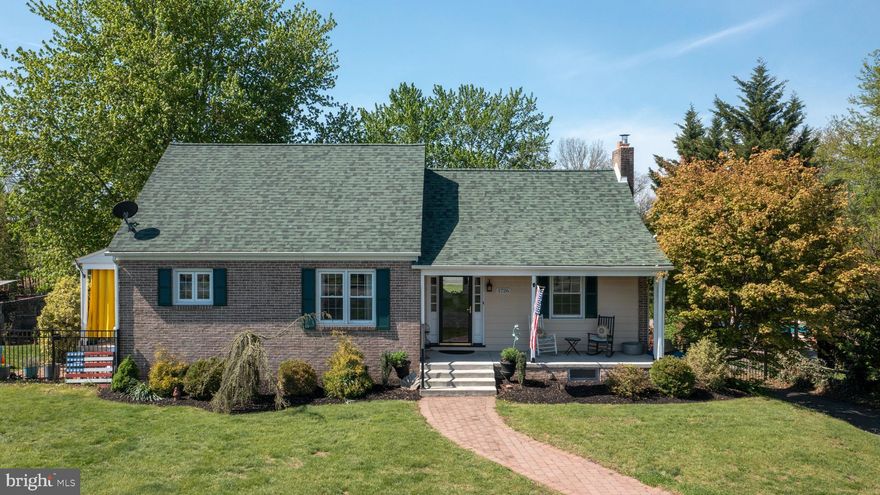 When mid century character, charm, and style  are combined with meticulous loving ownership upon this large lot, you will find HOME at 1726 Swamp Pike, New Hanover Township, Boyertown Schools. Driving up upon the expanded wrapped driveway it's the all American covered front porch, charming side covered porch off the kitchen, and fully fenced side and rear yards that capture your attention before entering the home. The quaint entry area greets you with original hardwoods floor throughout as you seamlessly transition into the expansive living room featuring a stone fireplace with wood burning insert, ample natural light from the large bay window looking out to your rear sanctuary, and the light tones that compliment the home's current decor. Opposite the living room is the bright formal dining area offset the fully refreshed and updated kitchen. The kitchen features crisp white cabinetry, complimentary dark granite countertops, new LVP flooring, as well as stainless appliances. The fully finished walkout basement boast expanded entertaining options with a family room area, cabinetry row with counter space for hosting, durable LVP flooring throughout, pellet stove,  full bathroom with stall shower and laundry closet, as well as direct access to the oversized 1 car garage area. The impressive primary bedroom consumes the full seconded floor of the home which features those gorgeous hardwood floors, quaint reading nook, large walk-in closet or even office space in this area, and primary bathroom. The large primary bathroom has an updated tiled tub shower great natural light from the rear window. Two sizable main floor bedrooms and full hall bathroom provide many options for diverse family living options in this home. The outdoor rear sanctuary is another highlighted feature on this large lot property being fully enclosed by fencing, with large deck overlooking the flat open rear yard, mature gardens/landscapes, additional paved parking on the rear of the home, large shed, and so many options for this amazing parcel!  With a new roof in 2020, new oil tank and central air conditioning in 2021, and premium whole house water filtration system in 2023; this solid mid century fully updated and loved home is waiting on you today.