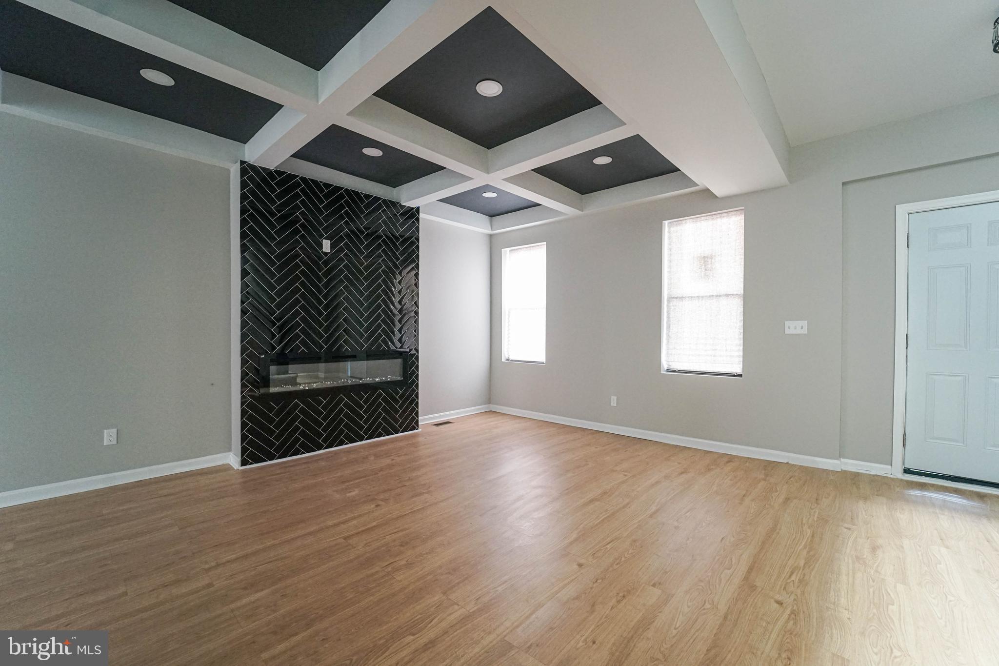 Opportunity Knocks in West Baltimore! This beautifully updated 4-bedroom, 3.5-bathroom rowhome is the perfect blend of modern finishes and smart investment potential. The stylish kitchen shines with stainless steel appliances, granite countertops, eye-catching pendant lighting, a sleek kitchen lighting, Fireplace and new flooring—ready for both daily living and entertaining. The main level also features a convenient half bathroom, Launder and beautiful fireplace. Upstairs, you’ll find three generously sized bedrooms and a fully renovated two full bathrooms and master bedroom with two vanities, complete with custom tilework and contemporary fixtures. If you are searching for your first investment or Home, this home checks all the boxes. With easy access to major highways and just under 10 minutes from Downtown Baltimore, this location is ideal for first time homebuyers Don’t miss your chance to tour this home.