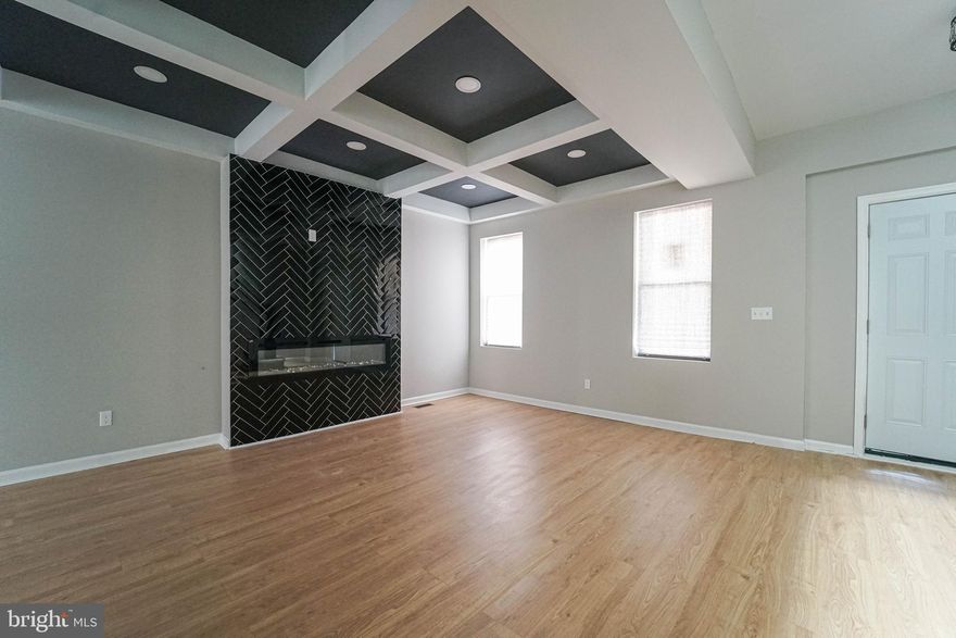 Opportunity Knocks in West Baltimore! This beautifully updated 4-bedroom, 3.5-bathroom rowhome is the perfect blend of modern finishes and smart investment potential. The stylish kitchen shines with stainless steel appliances, granite countertops, eye-catching pendant lighting, a sleek kitchen lighting, Fireplace and new flooring—ready for both daily living and entertaining. The main level also features a convenient half bathroom, Launder and beautiful fireplace. Upstairs, you’ll find three generously sized bedrooms and a fully renovated two full bathrooms and master bedroom with two vanities, complete with custom tilework and contemporary fixtures. If you are searching for your first investment or Home, this home checks all the boxes. With easy access to major highways and just under 10 minutes from Downtown Baltimore, this location is ideal for first time homebuyers Don’t miss your chance to tour this home.