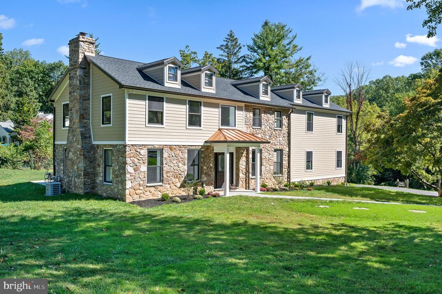 Welcome to 1546 Monticello Drive, an idyllic, new construction home situated on a highly desired street in the heart of Gladwyne. An expansive corner lot displays the charming and inviting exterior of the home, with a long driveway leading to the attached 2-car garage. Inside, the two-story entrance foyer is open and bright and sets the the tone for the rest of the home. Hardwood floors flow from room to room and plenty of windows are found throughout, allowing each space to be bathed in warm, natural light. The spacious formal living room features a wood burning fireplace, and French doors that lead to the extensive concrete patio, which overlooks the scenic views of Kenealy Nature park which can be seen from multiple viewpoints from the home. The dining room is open to the kitchen, making for an ideal space to entertain guests. The chef’s kitchen features a large center island with barstool seating, quartz countertops, crisp white cabinetry, and stainless-steel appliances. It opens to the family room with soaring ceilings and an exit to the patio making for easy indoor/outdoor living. The first-floor bedroom, with ensuite bathroom features a large walk-in closet and sliding doors that lead to a lovely side deck overlooking the grounds and park. A powder room completes the main floor. Upstairs, you will find 4 bedrooms, including the primary suite featuring vaulted ceilings, 2 spacious walk-in closets and an ensuite bathroom with a double sink vanity and glass enclosed shower. The first additional bedroom includes an ensuite bathroom, and the remaining two bedrooms are well-sized and share the spacious hallway bathroom. A second-floor laundry room completes this floor. Totally move in ready, with pristine finishes in every room makes this gem of a home all that it is. Conveniently located in close proximity to all major transportation routes, Center City Philadelphia, restaurants, shops, entertainment, and award-winning Lower Merion Township schools.