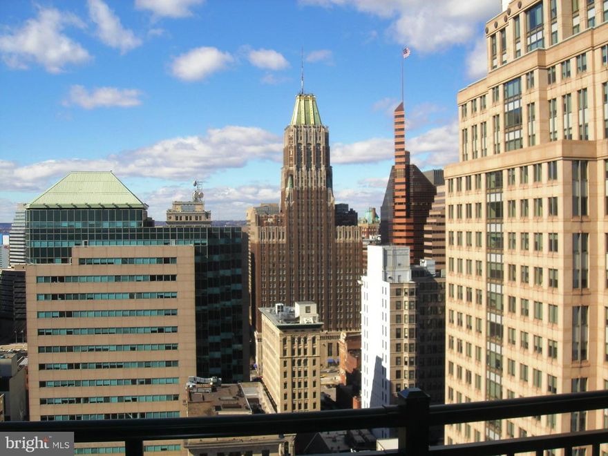 Best floorplan in building and the ONLY one bedroom unit that faces WEST and has harbor water view from private balcony.  Granite kitchen, central heat and a/c.  Assigned PARKING included in secure attached garage with 24-hour attendant.  24-hour front desk, on-site manager, rooftop pool, state of the art gym, party room, and internet business center.  Great location one block from waterfront promenade. BEST VALUE!