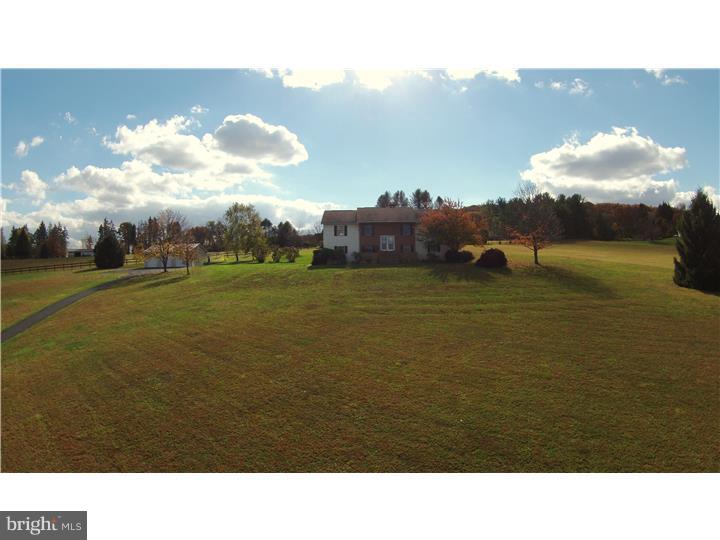 Nestled in the tranquil, secluded area of Durham Twp sits this beautiful 3500 Sq Ft home, ranging over 10 acres of land. If your dream home features an enormous kitchen to entertain, you have found it here. Including an extended island that seats 4 and an additional dining area, you will have all the room and more for your next gathering. The open concept between the kitchen and the large living area allows for fluidity and easy access between rooms. This 5 bedroom 2 Bath also includes a recreation room with over 350 Sq ft, pellet stove, extra living room, and Mudroom/Laundry room. Outside is the over sized 3-car garage that could be used for vehicles, toys, hobbies etc. This home definitely doesn't lack space! Schedule your showing today and marvel in the views this Bucks County property has that will take your breath away.