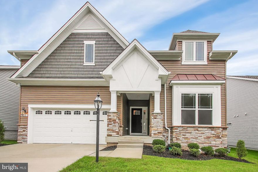 Luxurious Rancher Home in Bulle Rock Available for Immediate Delivery. The only community of it's kind in the area Bulle Rock features a 37,000 sq ft clubhouse with indoor lap pool, fitness center, ballroom, billiard room, fitness center & meeting room. The outdoor pool & tennis courts will amaze. The community is truly lives like you are on vacation. The home itself has it all 3 spacious bedrooms & 2 1/2 baths all on the main floor. Home has an Eat in Kitchen with Stainless Steel Appliances & Granite Countertops as well as a formal Dining Room. Main floor has wide plank hardwood floors & bedrooms are carpeted. Relax under your covered porch with access direct from the Master Bedroom. The lower level is completely finished & features a finished rec room, media room, full bath and plenty of storage. No waiting enjoy the luxuries of Bulle Rock today.