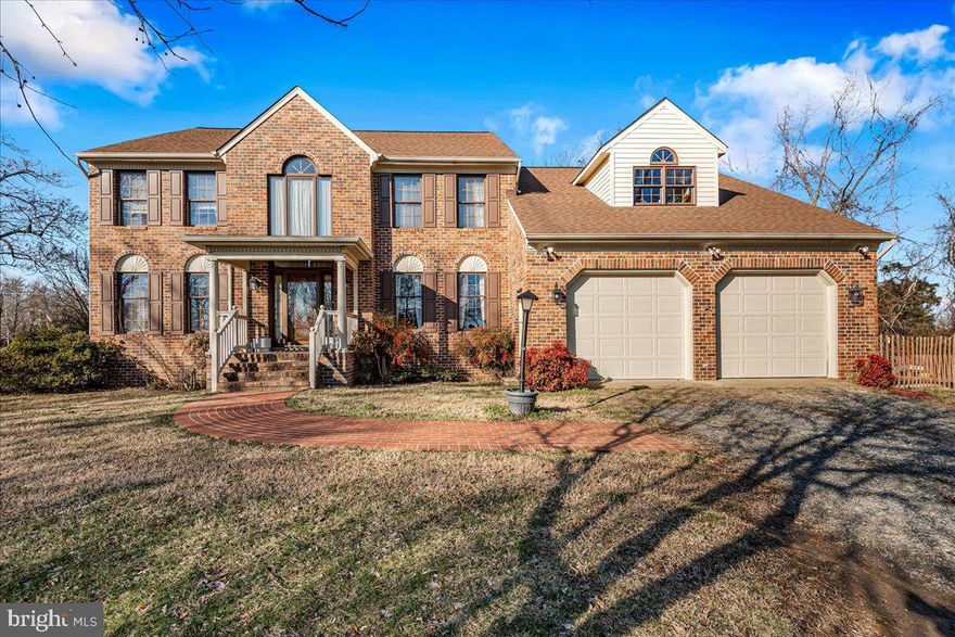 Welcome to your all brick custom built colonial.  As you approach this home you are greeted with a two story foyer.  On the main level you will find plenty of space for your gatherings to include a formal dining area, formal living room, PLUS a dedicated office.  Also, a  FULL BATH  and a newly RENOVATED kitchen that flows to the family room with woodburning fireplace.  Bring the party outside to the oversized deck for sunshine & on rainy days  you have the option to enjoy the screened in portion or the separate screened in gazebo.  Upstairs you will find a very substantial owners sweet with a large primary bathroom, soaking tub with peaceful views, double vanity and separate shower.  Attached to the owners suite is a sitting room, nursery or additional office space.  The other two bedrooms are nicely situated on the opposite side of the house.  The unfinished basement walks out back, includes a woodburning fireplace and is awaiting your finishes as it has been professionally waterproofed. Schedule your tour today!