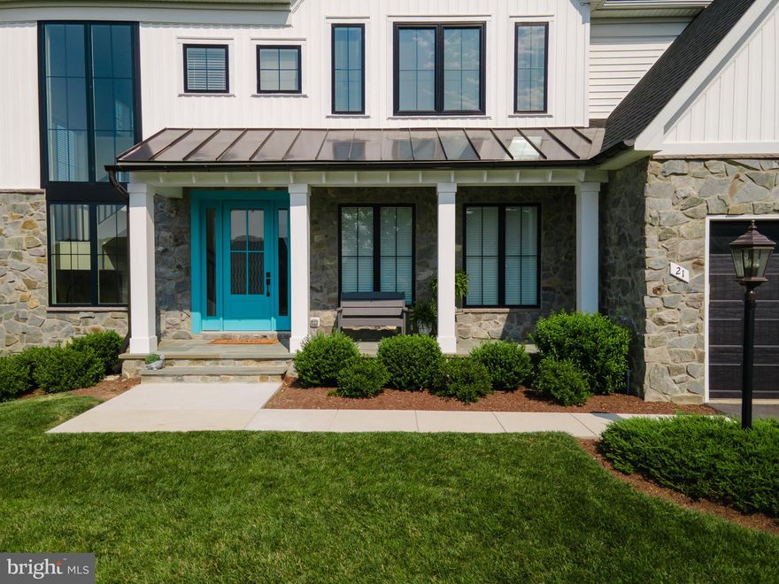 A stunning 2-year young, immaculately maintained, move  in ready home perfectly situated on a premium corner lot in the highly sought-after gated community of Beallair in Charles Town, Wv.  Weclome home to 21 Ella Washington Ct. This Modern Farmhouse home offers a rare blend of luxury and low-maintenance living, and delivers the lifestyle you've been dreaming of.  

Inside, you'll find a spacious and thoughtfully designed open floor plan, enhanced by high ceilings, large windows, and luxury finishes throughout. The heart of the home is the chef’s kitchen, featuring a large center island with farmhouse sink, luxury quartz countertops, stainless steel appliances, gas cooktop, and a wall oven—perfect for everyday living and effortless entertaining. Need a dedicated workspace or creative haven? You’ll love the beautiful studio with elegant sliding doors—ideal for art, yoga, or a private office.
Four large bedrooms grace the upper level of this spectacular home. The large primary suite is a tranquil retreat with a spa like bath that offers a floating soaking tub, walk-in shower, and private water closet. The secondary bedroom is an ensuite with its own private bath and walk in closet. Two additional spacious bedrooms share a Jack-and-Jill bath and boast a walk-in closet. A flexible upper-level loft/den and convenient laundry room add thoughtful touches of practicality and comfort.

A partially finished lower level offers a great space for recreation, media room, exercise room, whatever fits your needs. There's added room to grow, with a rough-in for a future bathroom and space for an additional bedroom. Outside, relax on your patio surrounded by tasteful hardscaping, and take in the park-like setting unique to Beallair’s thoughtfully designed lots.

Enjoy peace of mind with the HOA handling all yard maintenance, walking trails, snow removal, leaf raking, and common area upkeep—giving you more time to enjoy the things you love. Just outside your door, take advantage of resort-style amenities, including a community pool, fitness center, and scenic walking trails winding through beautifully maintained green space.



Located just minutes from major DMV commuter routes, national parks, quaint historic towns, fine dining, entertainment venues, and a nearby college town offering extended learning opportunities, this home truly combines luxury, location, and lifestyle.

Don’t miss your opportunity to live in one of the region’s most desirable communities—schedule your private showing today! In addition to all of the beauty, conveniences and comfort that this home has to offer, this Taylor Model, Wormald build has built-in equity. This Home offers you an opportunity of a lifetime, schedule your private tour! Offered below the appraised value.