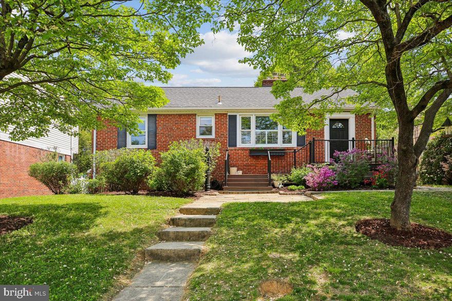Welcome to 9503 Ocala Street, a thoughtfully renovated residence in sought-after Indian Spring Hills, known for its quiet, tree-lined streets and midcentury homes. Meticulous updates and architectural character define this home, including replacement windows, newly refinished hardwood floors, reclaimed wood accents, plantation shutters, designer lighting, and a stunning quartz kitchen.
A stone patio, designed pathway, and new Trex composite front porch create an inviting approach, leading into a sunlit living room anchored by a fireplace with a reclaimed wood surround and a wide picture window. Newly refinished hardwood flooring enhances the space and sets a warm, welcoming tone. The living room flows directly into the thoughtfully redesigned kitchen, which features quartz countertops, generous prep space, stainless steel appliances including a Samsung gas range and new Bosch dishwasher, a breakfast bar area, farmhouse-style pendant fixtures, recessed lighting, handsome cabinetry with soft-close drawers, floating wood shelving, and oversized porcelain tile flooring. The formal dining room is accented by a contemporary drum light fixture and includes a convenient pantry for additional storage.
The bedroom wing offers a bright primary suite with an updated half bath, a second bedroom, and a refreshed hall bath showcasing hexagon tile flooring. This level also includes a fixed staircase to the unfinished, floored attic, currently serving as excellent storage with potential for future expansion.
The lower level provides additional living space, highlighted by a spacious family room with luxury vinyl plank flooring and a second fireplace, complemented by sconce and drum lighting. A flexible third bedroom or office features custom-built-ins and an updated en-suite bath with a wood-look tile shower. The laundry and storage room is well equipped with new luxury vinyl plank flooring, a new stainless-steel utility sink, an LG washer and dryer on pedestals, abundant storage space, and access to the rear yard.
Outside, the fenced and level backyard is ideal for relaxing or entertaining, complete with a stone patio, firepit, shed, and established landscaping, including a magnolia tree and colorful hydrangeas.
Ideally located in close-in Silver Spring, Indian Spring Hills offers a strong sense of community. Just blocks from Zinnia and Whole Foods, with easy access to Sligo Creek Trail, Downtown Silver Spring’s shops and dining, and just over two miles to the Silver Spring Metro Station and just over one mile to the soon-to-be-completed Purple Line light rail, this home also provides convenient access to multiple bus lines, I-495, Colesville Road, and Georgia Avenue. Enjoy comfort, accessibility, and a picturesque setting in one exceptional property.