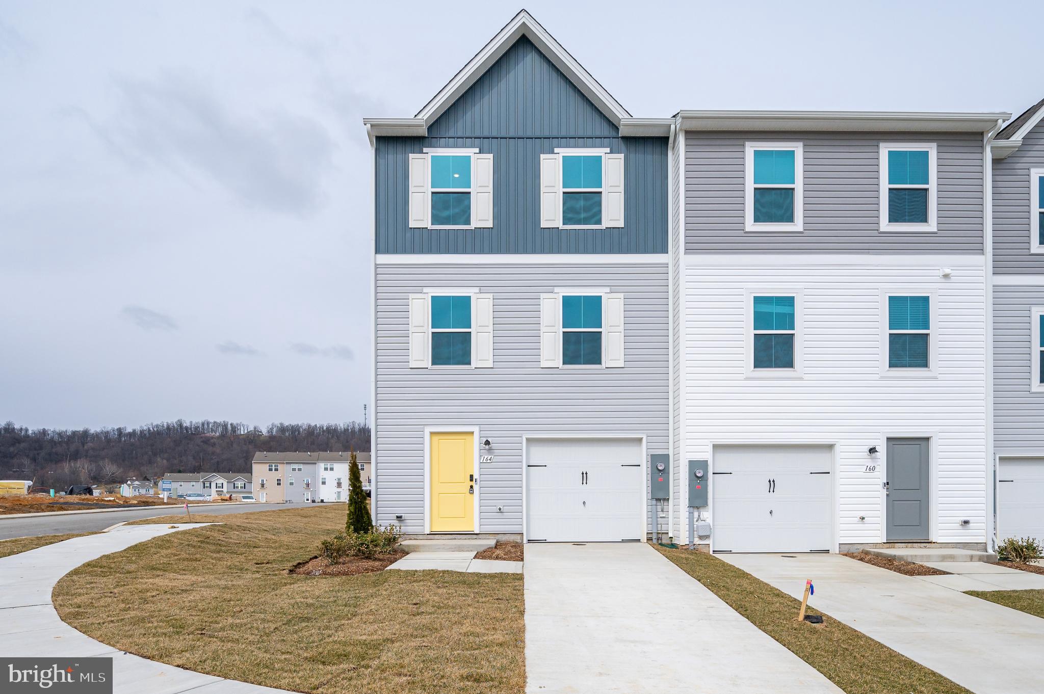 AVAILABLE TO MOVE IN MAY 1st OR SOONER! Located in the community of Dillon Farm in Hedgesville, WV. This newly built townhome features 3 Bedrooms, 2.5 Baths. Perfect commuter location with easy access to Route 9 and I81. Highlight of this townhome includes an open concept floor plan between the living/kitchen/dining on the main level. Seamlessly entertain from the kitchen’s 10ft island that features stainless steel appliances, built in microwave and dishwasher. Moving up to the third floor you will find the primary bedroom with walk in closet and private bath. Two additional bedrooms with full hall bath are also located in the upper level. The finished rec room could easily be used as a multi purpose space. Great as an office space or game/tv room. Gas community. Washer and dryer in unit. Applicant(s) must be able to pass credit/background check. Minimum 650 Credit Score. No Smoking. Security deposit and first month rent upfront. Call to schedule your private tour!