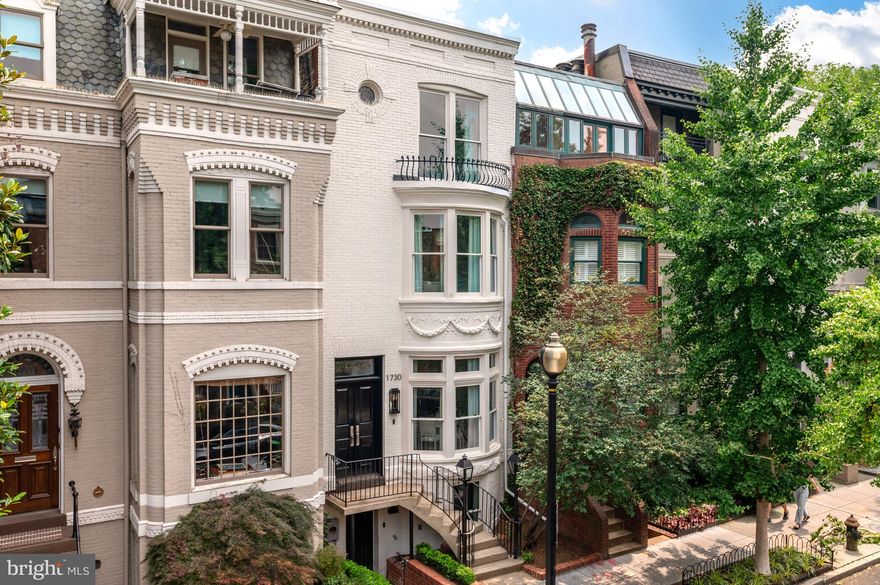 Exquisitely reimagined by Akseizer Residential, this impeccably appointed Victorian townhouse showcases a new level of grandeur in DC’s Dupont Circle neighborhood. Meticulously renovated to the highest of standards and utilizing designer fixtures and finishes, this sprawling 4 Bedroom, 3.5 Bathroom residence boasts unparalleled luxury living across 4 fully finished levels and 3,150 total square feet. Originally built in 1885, this Akseizer masterpiece has undergone a complete historic renovation to deliver a breathtaking property that honors the architectural integrity of the home’s original design while seamlessly integrating the coveted luxuries of a discerning modern lifestyle. Inside, elegant moldings, timeless trim and herringbone hardwood floors are complemented by soaring ceilings and abundant natural light. Outside, privacy abounds with a fully fenced rear patio that lends an idyllic setting for al fresco dining with a built-in BBQ Grill and ample space for entertaining. An urban convenience sure to delight any city dweller, this residence provides 2 private, off-street parking spaces.
