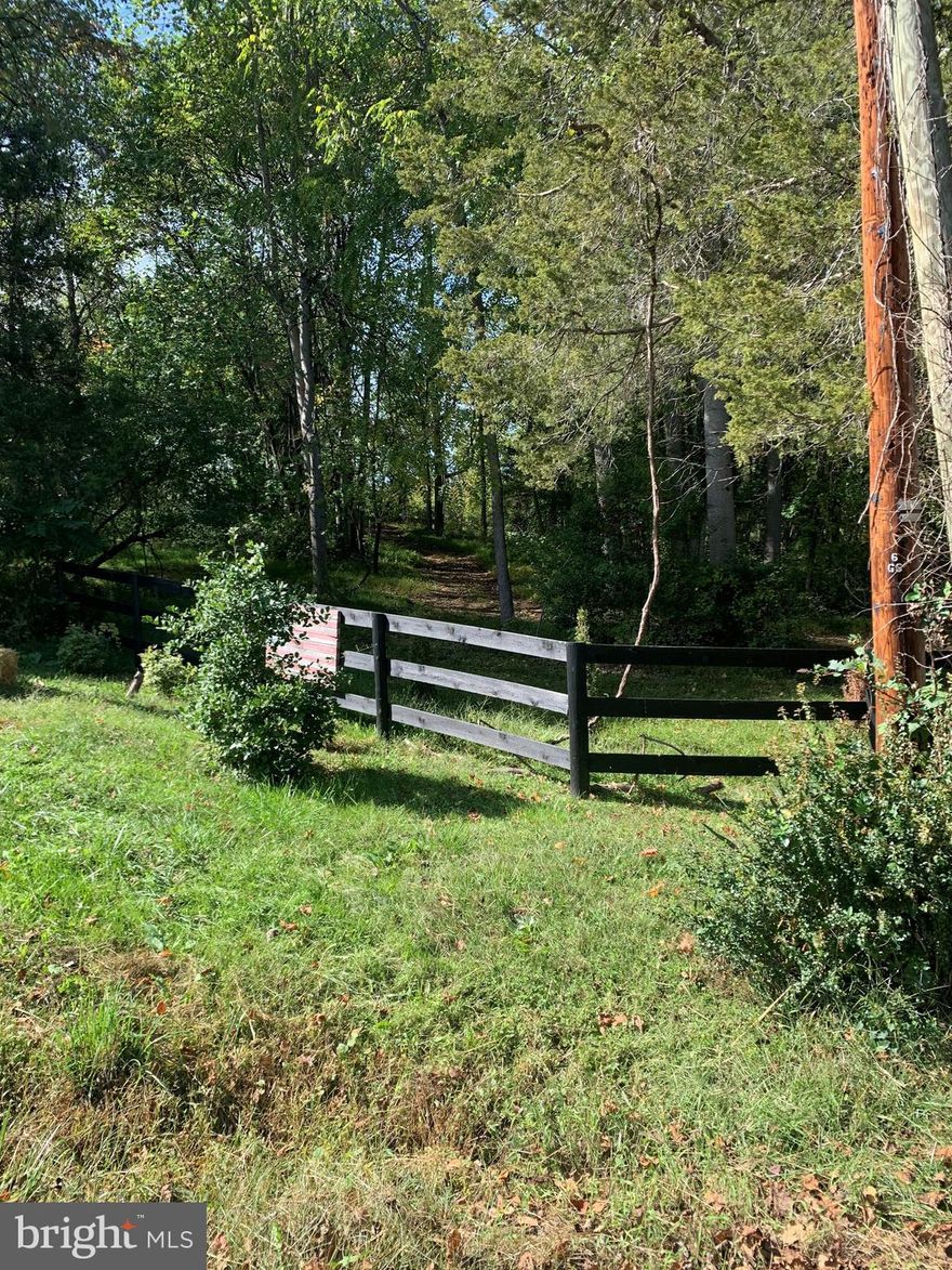 Beautiful 2.010 acre lot with site plan and previous perc that will have to be updated. Pasture and wooded. Some Fencing.