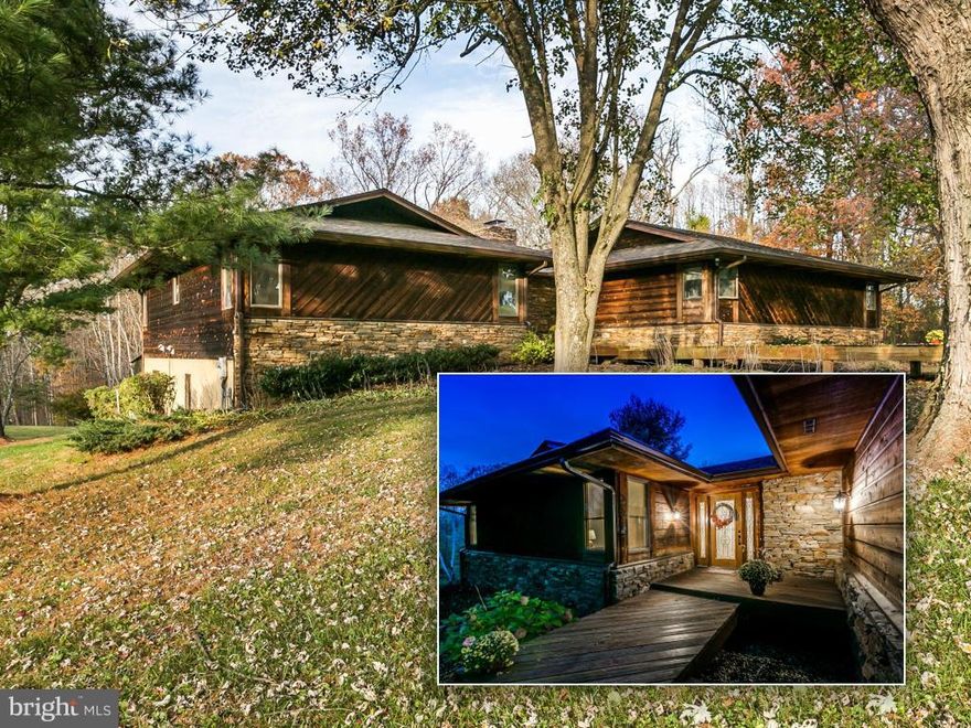Gorgeous views & total privacy on almost 4 acres in HZ. Stone & cedar contemporary ranch is ideal for multi-gen family w over 5000 sq. ft living space. Details incl. fab stone FP in LR, new hdws/carpet & family room w/wd-burning stove opening to kitchen. Updated MSTR STE, kitchen & baths. Comfortable, bright above grade in-law suite incl 2 BR's, full kitch & sun rm. Handicap friendly,3-car garage.