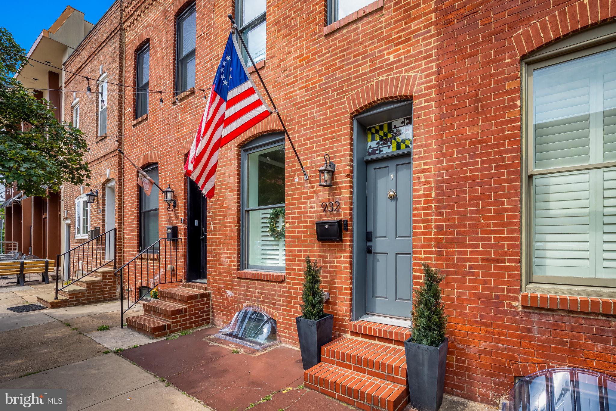 Welcome to 932 S Conkling St, a beautifully renovated CHAP-approved rowhome in the heart of Canton, offering rare features including a 2-car parking pad, rooftop deck with incredible city and harbor views, and 4 years remaining on the CHAP tax credit—which can save buyers thousands annually. Nestled on an oversized 93' deep lot, this home seamlessly blends modern luxury with historic Baltimore charm.
Inside, you'll find an open floor plan with natural light, showcasing hardwood floors, quartz countertops, a coffered ceiling with crown molding, and a spacious dining area. The designer kitchen is a showstopper, featuring an 8-foot island, stainless steel appliances, and a stylish tile backsplash—ideal for both cooking and entertaining. Upstairs, the large rear owner’s suite offers a walk-in closet, double vanity, frameless glass shower, and a linen closet. A centrally located laundry area adds convenience, and hallway access leads directly to the rooftop deck, where you can enjoy unmatched views of downtown Baltimore and the waterfront. The fully finished basement adds even more versatility, complete with a third full bathroom—perfect for guests, a media room, or a home office.
This home’s location is truly unbeatable—just blocks from Patterson Park, Canton Square, the waterfront promenade, top-rated restaurants, and local shops. You're in one of Baltimore’s most walkable and vibrant neighborhoods, with everything you need at your doorstep.
Best of all, the CHAP tax credit offers significant savings. With 4 years remaining, buyers can enjoy reduced property taxes that could total up to $30,000 savings, depending on the home’s assessed value. This makes owning in Canton more affordable than you might think, especially for a home with this level of quality and finish.
Don’t miss the opportunity to own a move-in-ready, high-end home with parking, a rooftop deck, and substantial tax savings in one of Baltimore’s most sought-after neighborhoods.
