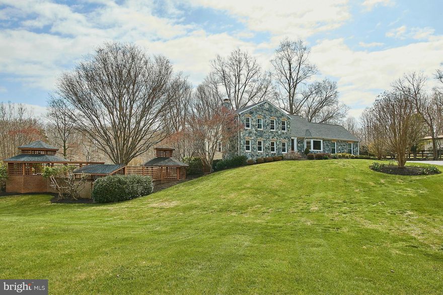 Exquisite Home on Picture Perfect Site*Fully Renovated in '09*Stone Front & Hardiplank*Cherry Hardwoods*New Carpet*Over 5,800 sq ft*Chef Kitchen w/Granite*Upgraded Cabinets*Stainless Steel*2 Family Rms w/Gas FP*Private Master Suite w/Dressing Room*Built ins*Updated Baths*Heated Pool*Gazebo w/Hot Tub*Sport Ct*Batting Cage*6 Stall Stable*Pasture*200amps each to House, Barn & Pool*H20 Filtration Sys