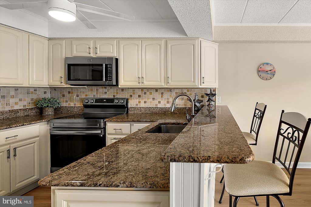 Photo of 6 136th Street #303, OCEAN CITY, MD 21842 (MLS # MDWO2040486)