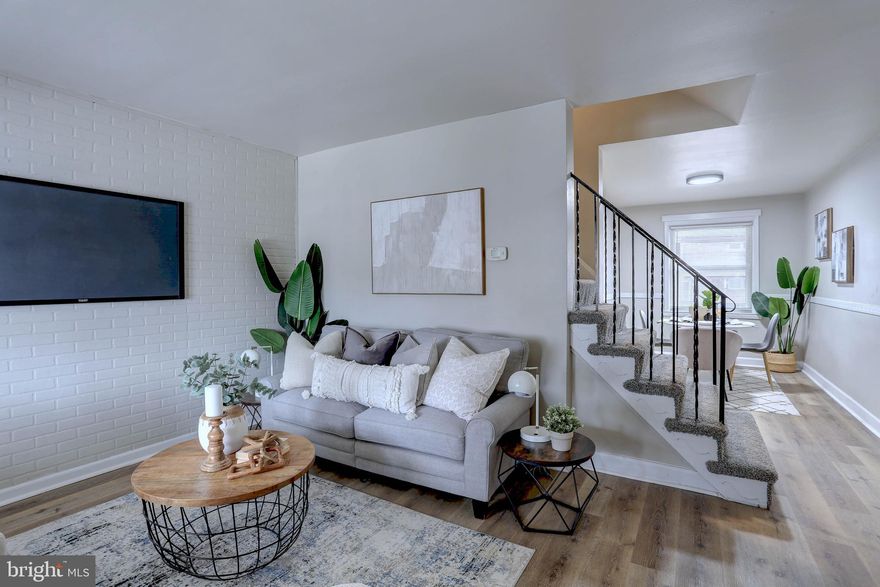 UPDATE -This home will be available to FHA buyers as of  1/9/2023 as well. Welcome to your charming new home! This beautifully renovated 2-bedroom, 1 1/2-bath row home is a perfect blend of modern comfort and classic charm. Step inside to discover the elegance of luxury vinyl plank (LVP) flooring that graces all three levels, providing a seamless and stylish foundation throughout.

The heart of the home is the well-appointed kitchen featuring crisp white cabinets and gleaming stainless steel appliances. This space is a chef's delight, inviting you to create culinary masterpieces while enjoying the beauty of your surroundings.

Imagine sipping your morning coffee on the quaint front porch or hosting gatherings on the inviting rear porch. With off-street rear parking, convenience is at your doorstep, making daily life a breeze.

The location is unbeatable, offering the best of both worlds - a peaceful retreat and proximity to all essentials. Within walking distance, you'll find schools, shopping, and a variety of restaurants, creating a vibrant and connected community experience.

Freshly painted throughout, this home is a canvas ready for your personal touch. Ideal for a charming starter home or for those looking to downsize without compromising on style and functionality. Don't miss the opportunity to make this house your home and start creating lasting memories in this delightful space. Welcome to a life of comfort and convenience!