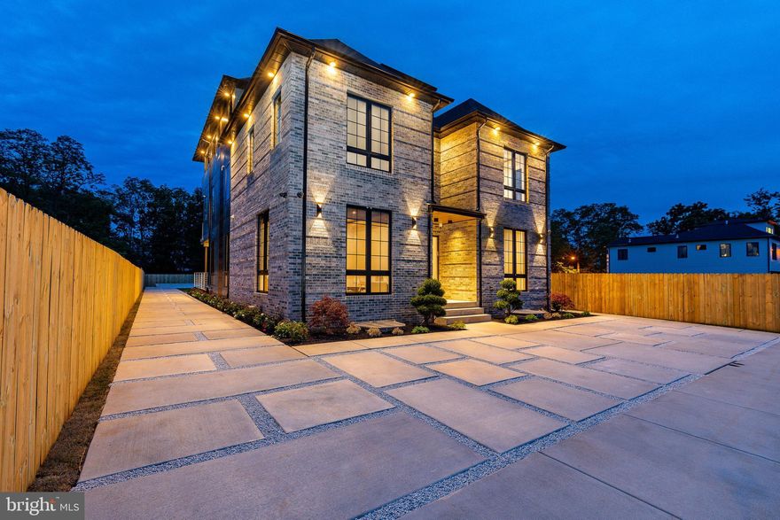 Welcome to 9739 Krewstown Road, a stunning home where modern luxury meets sophisticated design. This meticulously crafted home combines premium finishes, cutting-edge technology, and an open-concept layout to create an extraordinary living experience—both indoors and out. Adding to its appeal, the property has 9 years remaining on its tax abatement, offering great annual savings. Step inside to discover a bright, open layout highlighted by Brazilian hardwood floors throughout. The chef’s kitchen is a showstopper, featuring top-of-the-line stainless steel appliances, custom cabinetry, and  Taj Mahal quartz island. Multiple dining areas—including a formal dining room and casual breakfast bar—offer versatility for every occasion.  The living spaces are equally impressive, with spacious lounges and integrated smart home controls for lighting, climate, and entertainment. Retreat to the lavish master suite, a serene sanctuary with ample space and a spa-like en-suite featuring an oversized walk-in shower, dual vanities, and marble finishes. The second level continues the theme of luxury with four additional bedrooms, each with an en-suite bath, walk-in closet, and private balcony. A dedicated laundry room adds convenience. The fully finished basement extends the living space, boasting 10-foot ceilings, two additional bedrooms, a full kitchen, and a full bath—perfect for guests, an in-law suite, or a private retreat. Outside, the home offers an entertainer’s paradise with multiple living areas, including a spacious deck for al-fresco dining and a fully fenced, expansive backyard. The sleek exterior combines stone and contemporary siding, complemented by meticulously landscaped grounds and ample driveway parking. Every detail has been thoughtfully curated—from smart home integration to high-end finishes and stunning architecture—to deliver the ultimate modern lifestyle. This is more than a home; it’s an experience. Schedule your private showing today and discover luxury living at its finest.