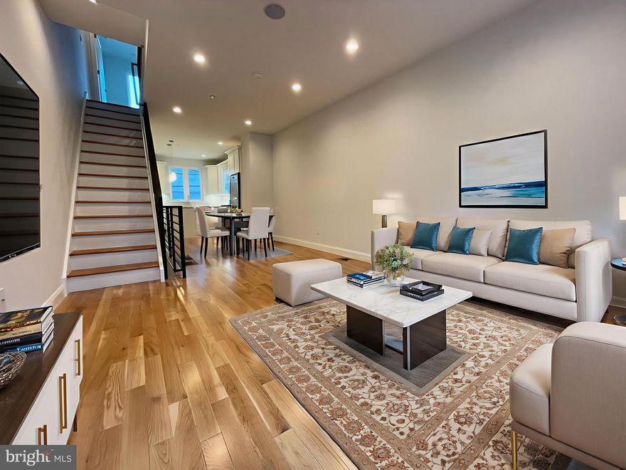 TAKE ADVANTAGE OF LOWER PAYMENTS--MOTIVATED SELLER READY TO BUY DOWN YOUR INTEREST RATE! APPROVED TAX ABATEMENT!
Welcome to 1432 S Taylor St, where modern luxury living is redefined in this newly constructed masterpiece by a high-end boutique builder. This home is a testament to meticulous attention to detail and complementary design choices. As you explore this pristine, light-filled four-bedroom, three-bathroom residence, you'll notice the handsome brick façade, oversized windows, and high ceilings that contribute to its appeal.

The home features solid Oak Armstrong hardwood floors adding elegance throughout. The kitchen and bathrooms are stunning, with designer touches that elevate their appeal. Each bedroom offers generous space and light, providing perfect relaxation spots. Designer lighting illuminates the entire home, and the finished lower level can serve as a fourth bedroom, an in-law suite, media room, work-from-home office or a fitness/yoga room. The expansive roof deck offers breathtaking 360-degree views including the entire Center-City skyline.

On the first level, the open floor plan welcomes you into a spacious living room and dining room, characterized by large windows, soaring ceilings, and hardwood floors. The eat-in kitchen is a culinary delight with 42-inch self-close cabinets, quartz countertops, a designer backsplash, a GE stainless steel appliance package, plus an expansive quartz center island with cabinetry below and designer lighting above. A rear door opens to a sizable rear patio with new fencing, perfect for dining al fresco.

Ascending the solid oak staircase with a custom iron railing to the second level, you'll find two sizable bedrooms, both with high ceilings, hardwood floors, large floor-to-ceiling windows, and ample closet space. The guest spa bath features double sinks, designer tiles, and elegant lighting. A laundry room is conveniently located on this level.

The private master suite is a sanctuary of comfort and style on the next level. The generous bedroom is flooded with light from floor-to-ceiling windows and complemented by a wall of deep closets. The master bath, the size of an average bedroom, includes a 60-inch quartz vanity with double sinks, porcelain tiles, and a frameless glass walk-in shower. Adjacent to the master suite, a hall area features a 70-inch buffet station with cabinetry, quartz countertops, a deep sink, a stainless-steel beverage refrigerator, and built-in shelving with a designer backsplash. This area provides direct access to the expansive roof deck, with views, views, views, and equipped with electric, water, and under-mount lighting.

The completely finished lower level offers versatile space for various uses, featuring wide plank flooring and ample storage. An additional spa bath with a frameless glass shower completes this level.

Additional amenities include recessed LED lighting and built-in speakers, 200 Amp electrical service, 2-zone HVAC and a large Pex manifold. Don't miss the opportunity to experience this stunning and visually pleasing home with an approved tax abatement. Schedule your appointment today to explore 1432 S Taylor Street, where luxury meets functionality. It's easy to show and guaranteed to impress.