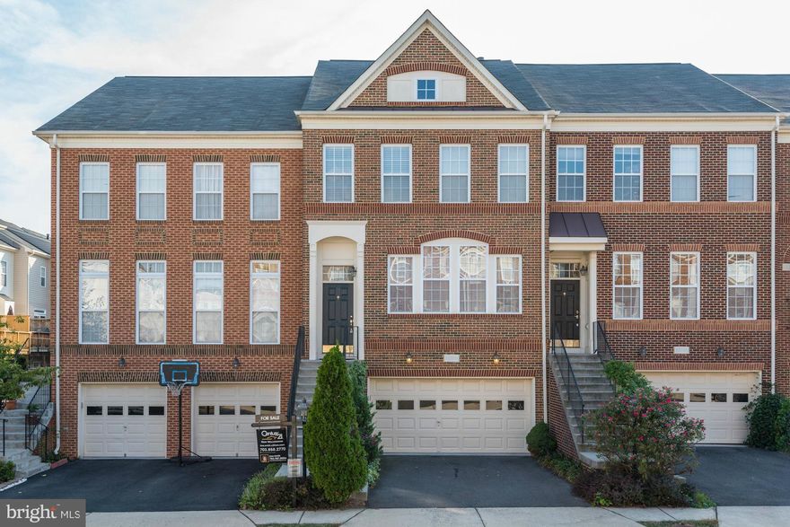 Fantastic town home in popular Broadlands! Brick front, 9 foot ceilings on main and lower level, hardwood on the main level & stairs, gourmet kitchen, 2 fireplaces, spacious deck, lower level huge rec room, full bath, generous 2 car garage w/ ample storage, upper level master suite w/ 2 walk in closets,  upscale master bath, 2 large secondary bedrooms, share hall bath, upper level laundry!