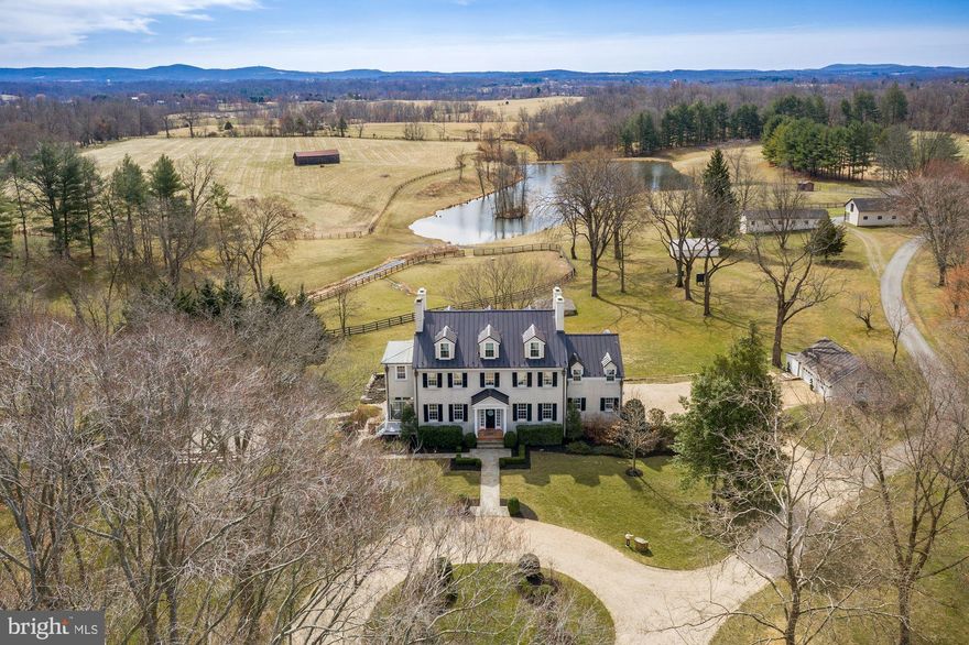 Mortgage Hall is situated in the heart of hunt country minutes from historic Middleburg. The 121-acre estate boasts a Georgian Mansion built in 1850 that currently operates as a destination event venue and horse farm. With scenic views of the countryside and Bull Run Mountains the “manor house” is the perfect venue or family home featuring 9 bedrooms (accommodating up to 20 guests), 5.5 bathrooms, a large eat-in kitchen with a sitting area, formal dining room, living room with wood-burning fireplace, library and WiFi throughout. Some of the many stunning features of the home are the grand ceilings, 6 wood-burning fireplaces, and restored hardwood floors. Relax and unwind with your guests on the large stone patio or fishing by the pond. The working farm offers 3 barns (6, 6, and 24 stalls), multiple fenced paddocks with auto-waterers and run-ins, 2 workshops, a chicken coup, and a tenant house. This grand retreat awaits you! Extensive updates have been made since 2019. Conservation Easement. See documents.