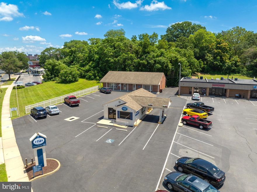 Attractive 1,255 SF turn-key professional office suite with welcoming reception, private restroom, and kitchenette. Ideal for medical, professional, or administrative use. Ample parking available.