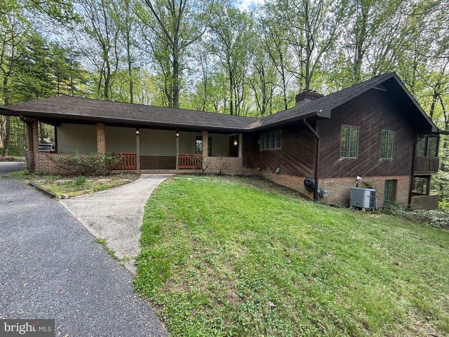 Seller is motivated to sell asap! Please send over any offer we are reviewing all!

Welcome to the sought-after community of Sagamore Forest! Offering over 2,800 finished square feet, this spacious home is move-in ready while also providing the perfect opportunity to add your personal touch. The main level features an inviting layout with hardwood floors in the living room and comfortable carpeting throughout the bedrooms. The large, open eat-in kitchen flows seamlessly into the screened-in porch, creating a wonderful space for everyday living and entertaining. This home also features skylights throughout the upstairs living and kitchen areas bringing in lots of natural sunlight.
The lower level expands your living options with a bedroom, a full bath, and a generous recreation room with walkout access. The converted garage is currently set up as a gym, offering a flexible space that can continue to be used for workouts, storage, hobbies, or reimagined to suit your needs. A radon mitigation system has also been installed for added peace of mind.

Outdoor living is a highlight of this property, with a two-level deck overlooking a beautiful wooded backdrop—an ideal setting for morning coffee, evening relaxation, or hosting guests. This home offers privacy, space, and the charm of a well-established neighborhood, all ready for its next chapter.