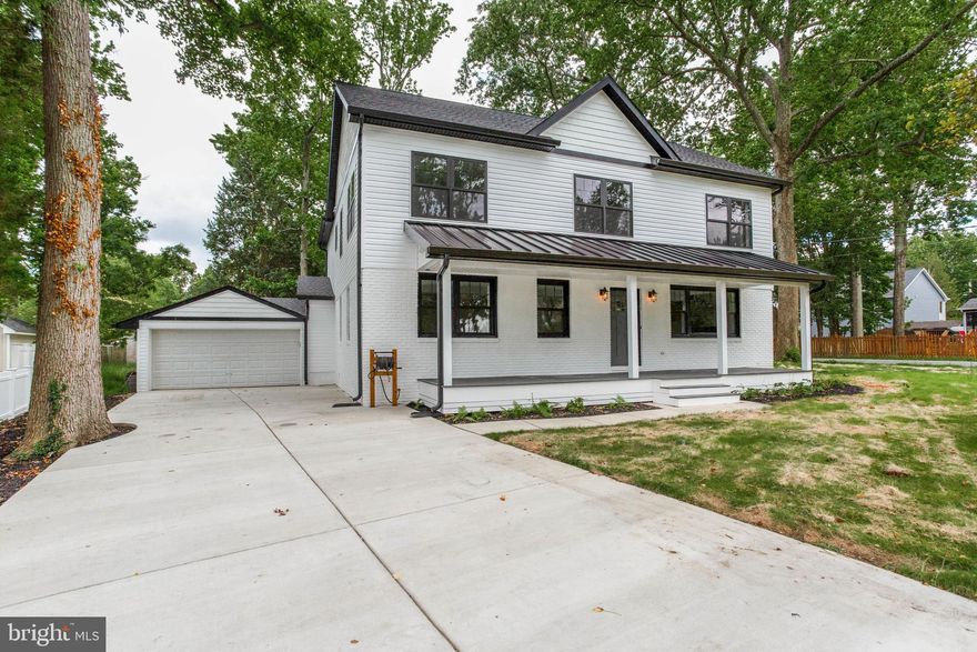 Custom built 5BR/5.5BA w/ 2 car garage across the street from & with views of the Chesapeake Bay in Deale! Top quality workmanship & products from the foundation up! No detail overlooked! New everything! Wide plank 3/4" hardwood flooring throughout! Custom craftsman style woodwork & trim details! Open eat-in white quartz kitchen w/ huge 9 1/2' island, 33  farm sink with Kohler Tournant kitchen faucet, gas cooking, Stainless 36  vent hood, Marble kitchen backsplash & Bosch 800 series appliances with microwave drawer, 36  propane cooktop, & double oven! Main level en-suite bedroom / 2nd master suite! 4BR/4BA on upper level! All BRs en suite! Master suite overlooking the Bay w/ walk-in closet, 7 x 4  step-in rain shower w/ subway tile & herringbone tile floor & 70  stand alone tub! Just a short drive to all things DC! Anderson Black low-e 100 series Windows! New Dual zone HVAC! All new plumbing system with 11.5 gallon per minute tankless water heater! All new electric with upgraded 300amp panel! 42  Propane fireplace w/black granite surround! Attached 2-car garage! Kohler toilets/fixtures/tubs! 8 x8  upstairs laundry with farm sink and butcher block counter! Upgraded well pump with 1 1/4  line feeding constant pressure fire sprinkler system and white flush-ceiling sprinkler heads! Pre-wired for in ceiling speakers in main living areas! All bathrooms and laundry sound insulated! LED trims in all 58 can lights to reduce energy/ cooling costs! Call today for your private showing!