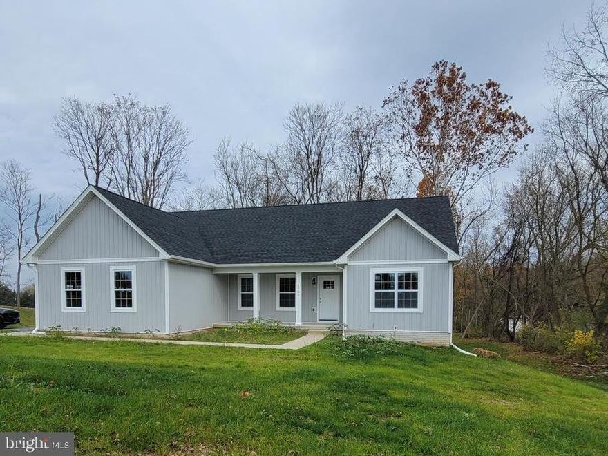 Sideload garage with home facing Billmyer Mill Road. No HOA with this brand new  home! Craftsman/Ranch style home which boasts the sought after split bedroom design. The kitchen/dining combo is open to the expansive great room and features vaulted ceilings and optional gas fireplace. Home is larger than it looks. It has a full basement. Buyer pays transfer tax stamps. Measurements approx. Photos of similar construction. Builder has tastefully selected all finishes for your new home. Grey siding add stone water table option for $3,500. Brushed nickel fixtures, stainless steel kitchen appliances consisting of Range, Refrigerator, Microwave and Dishwasher. Bianco Diamante granite counters with white cabinets. OCTOBER 30th  for your closing date!