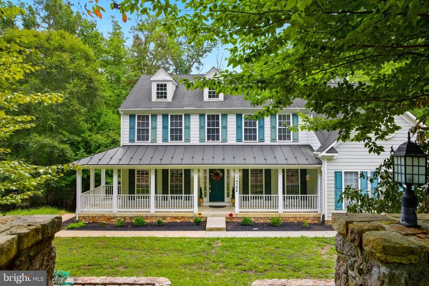 Nestled in a serene setting, this exquisite Colonial-style residence offers a harmonious blend of luxury and comfort, perfect for those seeking an elevated lifestyle. Spanning an impressive 4,722 square feet, this home is designed for both relaxation and entertaining, featuring four spacious bedrooms and three and a half elegantly appointed bathrooms, and two more bonus room in the lower level. Step inside to discover a warm and inviting interior, where crown moldings and recessed lighting enhance the sophisticated ambiance. The gourmet kitchen is a culinary enthusiast's dream, boasting upgraded, and large countertops. A pantry for ample storage. Equipped with high-end appliances, including a double oven, built-in microwave, and a cooktop, this kitchen seamlessly flows into the family room, creating an ideal space for gatherings. The formal dining room offers a refined setting for special occasions, while the breakfast area invites casual meals bathed in natural light. Retreat to the primary suite, a sanctuary of tranquility featuring a luxurious soaking tub and a spacious walk-in closet. The fully finished basement, complete with a wet/dry bar and provides additional living space for entertainment or relaxation, with convenient access to the outdoors. The exterior of the property is equally impressive, showcasing extensive hardscape, stone retaining walls, back to a lush wooded area. Enjoy the tranquility of nature from your deck or porch, perfect for morning coffee or evening gatherings. The secluded lot offers a premium setting, with a sloping terrain that enhances the scenic vistas of the surrounding trees and woods. Parking is a breeze with an attached rear-entry garage accommodating two vehicles, complemented by a spacious driveway. This home is not just a residence; it's a lifestyle, offering a perfect blend of luxury, comfort, and privacy in a picturesque setting. Experience the joy of living in a home that truly embodies elegance and warmth. Opportunity to save an have an assumable FHA loan of 5.5%!!