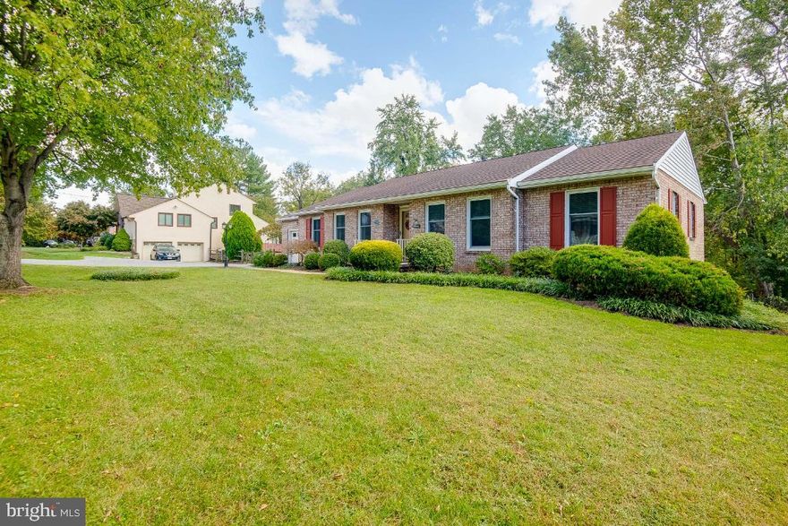 OPEN HOUSE FOR SAT, 11/20 IS CANCELLED
Beautifully updated rancher situated on landscaped lot with seasoned trees and picturesque setting.   Truly turnkey with loads of updates throughout offering “Easy Living”!  (Full list of updates in attached Features & Updates Sheet).  The traditional floor plan offers separate living and dining rooms with beautiful hardwood floors.  A recently renovated kitchen (2014) with breakfast area is a “Wow” factor showcasing gorgeous cherry cabinetry with pull out cabinetry, an oversized island ideal for entertaining and casual meals, granite countertops, recessed lighting & large pantry.   The private rear yard with deck and extensive hardscaping is conveniently accessible off kitchen as well as lower level walk out.   The Primary bedroom includes  a completely renovated and stylish ensuite bath (2020).   Two additional bedrooms and full bath complete the main level.  Additional finished space is offered in the partially fin lower level with easy access off breakfast room.  This inviting open space offers a multitude of uses - family room, recreation room, playroom, etc with a walk-out to patio and fenced backyard.  The large work room area includes Washer/Dryer, utilities, sump pump and so much space to use for storage, work room, etc. Ample parking opportunities with 1 car garage and  extra wide driveway.