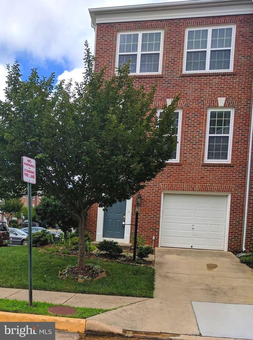 Beautiful Brick Front End Unit Townhouse with three levels including bump outs.  Fully finished walk-out basement with full bath and bonus room.  Fantastic open kitchen with stainless steel appliances, breakfast and family room, living and dining room on main level including powder room.  Master suite has a tray ceiling, walk-in closet and sitting room, separate shower and soaking tub in master bath.  Upper level has two additional bedrooms and another full bath.  Oversized yard with small patio and deck off main level.  Lots of additional parking close to townhouse.  Walking distance to pool and close to 95 and Lorton VRE.  Great Neighborhood amenities.
