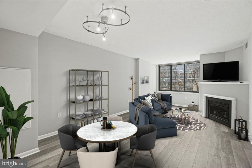 Welcome to the Continental! Located in Arlington's vibrant and centrally located neighborhood of Ballston, this 1 bed, 1 bath condo provides access to the best of the local DC and Arlington offerings. This recently renovated condo showcases brand new modernized grayscale flooring throughout both the main living area and bedroom, a built-in fireplace feature with mantel, all black appliances, an in-unit washer dryer, a bedroom walk-in closet, fresh painting, and stunning views of downtown Ballston. The kitchen offers a wide birth of space for cooking gourmet meals, generous countertop depth, and an island to assist in food preparation and presentation. The Continental Condominiums is an amenity rich building boasting a fitness center, rooftop pool, rooftop terrace with lounge seating and fire pits, rooftop grilling area with a walk up bar for entertaining guests, conference room, business center, community lounge, and concierge. Walking distance to multiple metro stations and local public transportation, retail, restaurants, nightlife, and many of the areas favorite Arlington destinations. Ballston also offers a wide variety of outdoor activities, walking paths, dog parks, and outdoor recreation areas that may easily be accessed from the front door of The Continental. The unit includes one parking spot (Parking G-179) and one storage space (S-11).