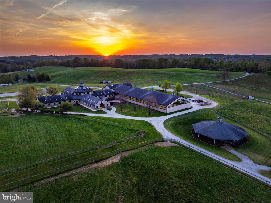 This offering marks an extraordinary opportunity to acquire one of North America’s most prestigious properties. While the 437.5 acre farm is globally celebrated for its history of breeding, training, and raising excellence and many world-class sport horse champions, the focus now turns to the sale of the physical estate, a masterpiece of equestrian infrastructure and natural beauty now available for its next chapter.
The property is defined by its remarkable landscape, featuring 200 wooded acres of mature trees, 220 acres of pastureland, and 15 acres of impervious structures across the gently rolling terrain of Cecil County. Bordered by 1.3 miles of tranquil waters of the Octoraro Creek, the land offers a rare combination of high-performance utility and serene privacy. The sale includes comprehensive, established equestrian infrastructure, highlighted by a 36-stall main barn, 2 outdoor arenas, 12 fields, 31 paddocks, 14 dwellings, 2 additional barns, and numerous equine facilities that have served as the benchmark for elite sport horse development for decades.  
The true value of Hilltop Farm’s footprint lies in its versatility; it is a canvas limited only by the scale of one’s imagination. While its equestrian pedigree is unrivaled, the estate invites a bold repurposing as a world-class Agri-Tourism Destination or a Private Legacy Compound. The riverfront and woodlands are perfectly suited for a Luxury Wellness Retreat, with riparian trails just a stone's throw from the urban corridors of Philadelphia, Baltimore, and DC. 
As this historic operational chapter concludes, the property is now positioned for a new curator to inherit a landscape of immense function and beauty.  This is a rare chance to own a sanctuary that has been both a stage for international sport and a community standard-bearer.