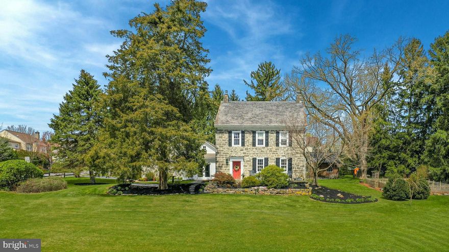 Notable for its timeless heritage and beauty, The Carter Republic House stands on land that was part of the Walking Purchase of 1737. The original deed lists founding father John Penn as the first owner of this meticulously preserved treasure with 1790s beginnings. Random width pine floors, crown moldings and deep silled windows enhance three levels of living space. Ten-foot ceilings and a wood burning fireplace are found in the inviting living room. The gourmet kitchen is equipped with fine appointments including soapstone countertops, custom cabinetry, high end appliances, an island with seating and adjacent dining area. A former summer kitchen has been transformed into a delightful family room with second working fireplace, stone walls, and French doors to a professionally landscaped yard. Captivating outdoor living space includes a flagstone patio with covered pergola, a five person Viking hot tub, raised bed vegetable gardens, and a 18x24 outbuilding with vaulted ceiling and built-in shelves for great storage options. Three zoned heating and air conditioning, public water and sewer and a two-car attached garage are desirable amenities. History and luxury in an exceptional Lehigh Valley location, this landmark property has easy access to commuter routes, upscale shopping and restaurants, and popular recreational and medical facilities.