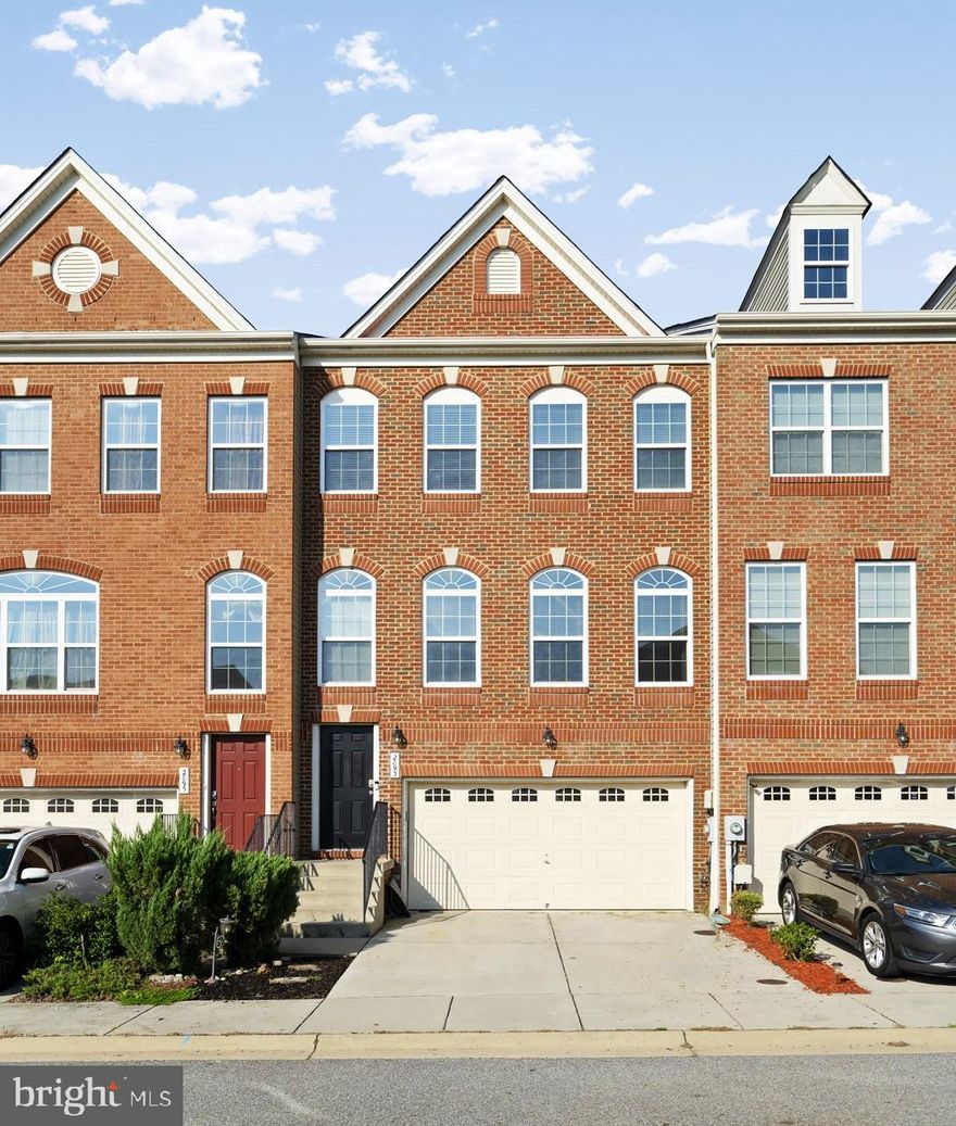 3 story brick front home with 2 car garage, large deck and fenced back yard! You will fall in love with the beautiful natural light of the 2-story foyer leading into the living room.  The spacious living room is adorned with gorgeous palladium windows. Harwood floors in the kitchen and dining space. The kitchen is chef ready with updated cabinetry, stainless steel appliances, granite counter tops, and breakfast island. The large dining space opens to the rear deck, perfect for grilling and entertaining. Upstairs you will find the primary bedroom with vaulted ceiling. The private primary bath suite includes spa soaking tub, large, tiled shower, dual vanities, and opens to the huge walk in closet. Two additional bedrooms, the washer and dryer, and a hall full bathroom with dual vanities complete this level. The lower level is the perfect recreation space, perfect for any hobby or just relaxing. walk out level to the fenced rear yard.