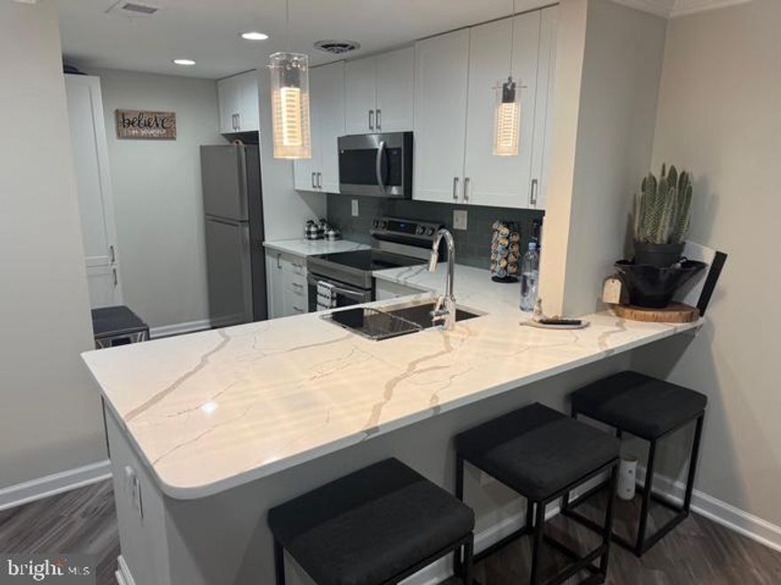 Back on the Market!  due to Financing Issues of Previous Buyers!    Hosting another Open House today, Sunday, at 12:00noon!   Come and visit this beautiful Townhome!   Fully Renovated and Upgraded!   New HVAC system!   New Windows throughout the property!  New Floors throughout the property!  New Kitchen!    New appliances!  New kitchen Cabinets!    All bathrooms are New!    The Master Bedroom has a Private Bathroom (fully renovated)!    New Laundry Appliances! I    TWO PLASMA Televisions (new) could convey & remain at the property!  Property shows well!      Discover the charm of Townhome style close to everything!  This lovely townhome in the Gaithersburg section of Nathans Hill offers impressive interior features, but don't overlook its prime location. Tucked away on a street bordered by sidewalks and greenery, the home is convenient to shopping options, schools, and recreational opportunities. After your local excursions, you'll return to the appeal of townhome living in the popular Nathans Hill development. A low-maintenance yard means more free time for you. Representing the welcoming personality of the home, a front-facing breezy porch is a nice spot for relaxing with beverages, whether in solitude or among friends or neighbors. Inside, the home makes a strong first impression. The home's neutral colors let the natural light do the talking, creating spaces that feel calm and uncluttered. Premium appliances gleam and add value. The efficient one-wall layout makes great use of the space. As a roomy place to start and end each day, the newly updated bedroom delivers. The views from here speak for themselves. The other two bedrooms are no afterthought, each quiet and individually unique, all on a separate level from the primary. This is the one that ends the search..