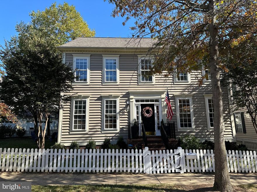 **OPEN HOUSE CANCELLED-UNDER CONTRACT**This stunning NV Abernathy Colonial in the coveted Lakelands community offers 5 bedrooms, 3.5 baths, and over 4,000 sq. ft. of thoughtfully designed living space. Bright, open, and airy, the home welcomes you with a grand two-story foyer adorned with marble tile floors and 9-foot ceilings that allow abundant natural light to flow throughout. 
The main level boasts elegant Brazilian Cherry hardwood floors that run through an inviting living room, a large family room centered around a gas fireplace, and a wall of windows that offer serene views of the expansive rear yard. The formal dining room exudes sophistication with custom trim shadow boxes and a designer chandelier, perfect for entertaining. At the heart of the home is a beautifully renovated kitchen featuring pristine white cabinetry, hand-finished tile backsplash, sleek granite countertops, and high-end stainless steel appliances, including a professional-grade Blue Star gas range with double oven and 8 burners. A custom oversized island, complete with seating and a brand-new built-in wine fridge, makes this kitchen as functional as it is stylish. The main floor also includes a newly renovated powder room, a large laundry room, a butler’s pantry, and a spacious pantry for added convenience.
 Upstairs, the Brazilian hardwood floors continue across a generous landing area. The primary suite offers a serene retreat, complete with a tray ceiling, new ceiling fan, and a spacious walk-in closet. The en-suite bath is a true oasis, featuring a soaking tub, separate shower, double vanity, and a private water closet. Three additional well-sized bedrooms, each outfitted with new ceiling fans and custom decorative touches like wainscoting, share an updated hall bathroom with new fixtures.
The fully finished lower level provides endless possibilities, highlighted by luxury vinyl plank flooring and recessed lighting. This versatile space includes a playroom, an updated full bathroom, a fifth bedroom with direct backyard access, a gym area, and a custom-designed, state-of-the-art theater room that is perfect for movie nights or gaming.Outside, the home boasts one of the largest side yards in the Lakelands, fully enclosed by a fence. A brick patio, accented by a tranquil stone water feature and koi pond, offers a peaceful space for outdoor dining or relaxation. Rounding out this home’s impressive list of features is a detached two-car garage with additional storage.
This property is a rare gem in an unbeatable location, offering a blend of luxury, comfort, and style both inside and out. Ideally situated on a quiet street, the home is just a short walk to downtown Kentlands, where you’ll find shops, dining, and entertainment options. Additionally, the neighborhood is surrounded by numerous walking and hiking trails, making it perfect for outdoor enthusiasts.