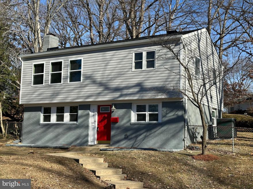 Huge price reduction!   Welcome home to a beautiful completely renovated four bedroom, two full bathroom single family home on a huge 1/3 acre fenced lot and quiet cul-de-sac.  No HOA! Everything is new in this home, including a new roof with architectural shingles, siding, gutters, windows, new HVAC with ductwork and thermostat, electrical panel, recessed lighting, flooring, cabinets, all new appliances and new remodeled bathrooms. As you enter the home you are greeted by an inviting family room with a fireplace perfect for entertaining with recessed lighting and plenty of windows for natural light.  Upstairs is an open concept gorgeous modern upgraded kitchen with  all new stainless steel appliances, granite countertops, large custom cabinets, upgraded lighting fixtures, and exquisite backsplash, leading to a large addition.  The home has four well sized bedrooms and two fully remodeled bathrooms with custom tile work. The huge fenced backyard is the perfect setting for large family gatherings and cook outs and features a large shed with a new roof.  Convenient easy access to Potomac Mills, Stonebridge Potomac Town Center, with multiple major quick routes to Fort Belvoir , Quantico Marine Base, Pentagon, Arlington, Fairfax, and DC. VRE and commuter bus minutes away.