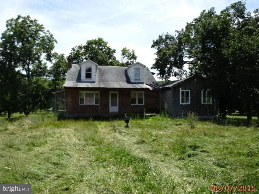 3 BR 1.5 BA Cape Cod home. First floor family room with fireplace. Eat-in Kitchen with ceiling fan. Living room with wood floors. Partially finished basement with fireplace and french doors leading to rear yard.  Covered front and side porches.  Mailing Address Continued: Auburn