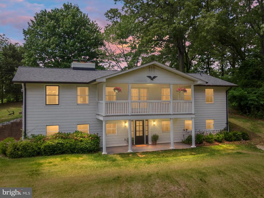 Welcome to your dream farmhouse retreat!  Tucked away on 6.47 agriculturally zoned acres in the heart of Port Republic, this Pottery Barn-perfect farmhouse exudes warmth, character, and modern functionality. Lovingly cared for and thoughtfully updated, this 3-bedroom, 3.5-bathroom gem offers space, style, and serenity.

Inside, you'll be greeted by rich hardwood floors on the main level, a cozy wood stove, a classic fireplace, and a charming electric fireplace—creating inviting ambiance in every season. Two of the three spacious bedrooms feature private ensuite bathrooms, offering comfort and privacy for family, guests, or multigenerational living.

Step outside and experience all that country life has to offer. With 6.47 acres of open, usable land, there’s room to garden, raise animals, or simply enjoy wide open views. The oversized 4-car carport is fully equipped with electric and water, making it the perfect setup for projects, entertaining, or future expansion.

Located in picturesque Calvert County, you're close enough to commute, yet far enough to live the peaceful lifestyle you've been dreaming of. Whether you're homesteading, hosting, or just enjoying the quiet, this home is the full package.