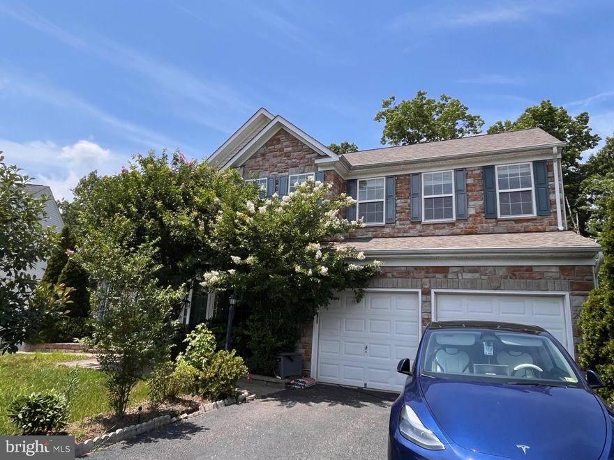 *The property being offered for lease is the TOP 2 LEVELS of the home ONLY!  Landlord is occupying the basement.*   Top 2 levels of this single family home offered for rent! All UTILITIES and YARD MAINTENANCE INCLUDED!! Living space includes 5 bedrooms, 2 full baths and 3,120 square feet! The main level has an open floor plan featuring a 2 story foyer, formal living room and dining room, an office, updated kitchen, HUGE sun room and family room! Hardwood flooring throughout the main level.  Kitchen offers granite counter tops, stainless steel appliances, recessed lighting, an island, and connects to a bright sun room with vaulted ceilings and a door out to the Trex deck.  Spacious family room sits off the kitchen and has a brick fireplace for those cozy winter nights. Laundry room is off the kitchen and has access to the garage. The upper level also features hardwood flooring throughout!  Large primary bedroom has 2 walk-in closets and a primary bath that has a soaking tub, separate shower with tile surround, and double vanities.  The other 4 bedrooms share a newly renovated hall bathroom with double sinks, ceramic tile flooring and tile shower with frame-less glass door. Property has just been professionally cleaned. Tenant has full access to the deck and lower level patio.  The 2 garage spaces are also for use by the tenant and 1 driveway spot if needed.  All utilities and yard maintenance included.  Landlord has separate access to basement and separate laundry so nothing is shared besides a driveway spot. Great commuter location convenient to I-95, VRE and close to shopping, restaurants and Wegmans at Stone Bridge at Potomac Town Center!