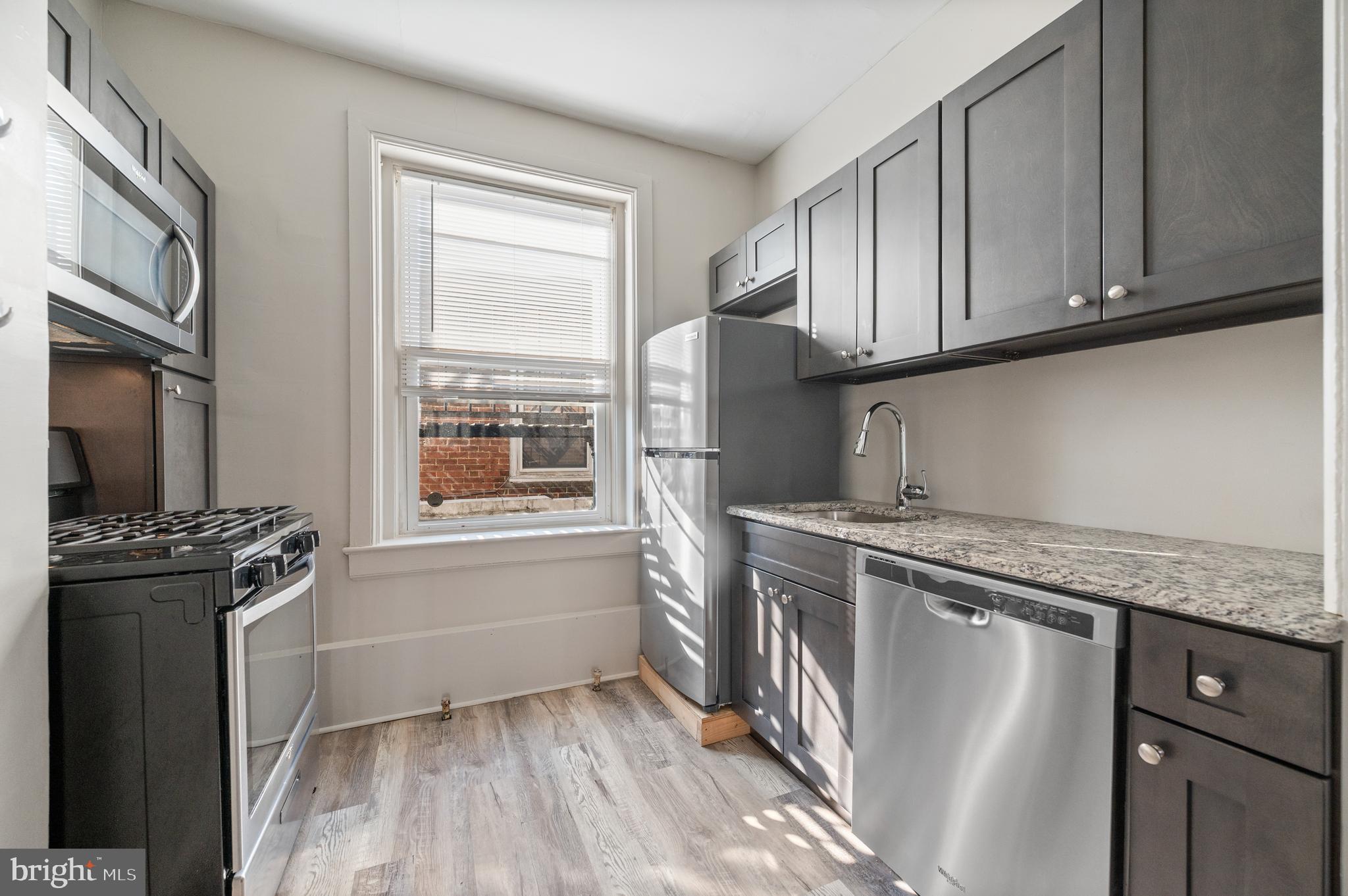 This beautifully renovated 2-bedroom, 1-bathroom apartment is perfectly located in the center of Bryn Mawr, just a short walk to the train, shops, and a wide variety of restaurants. The unit features new flooring throughout, stainless steel appliances including a dishwasher and built-in microwave and ceiling fans. Parking available for an additional monthly fee. Shared washer and dryer in building. Enjoy modern living with unbeatable walkability and access to everything the Main Line has to offer.
