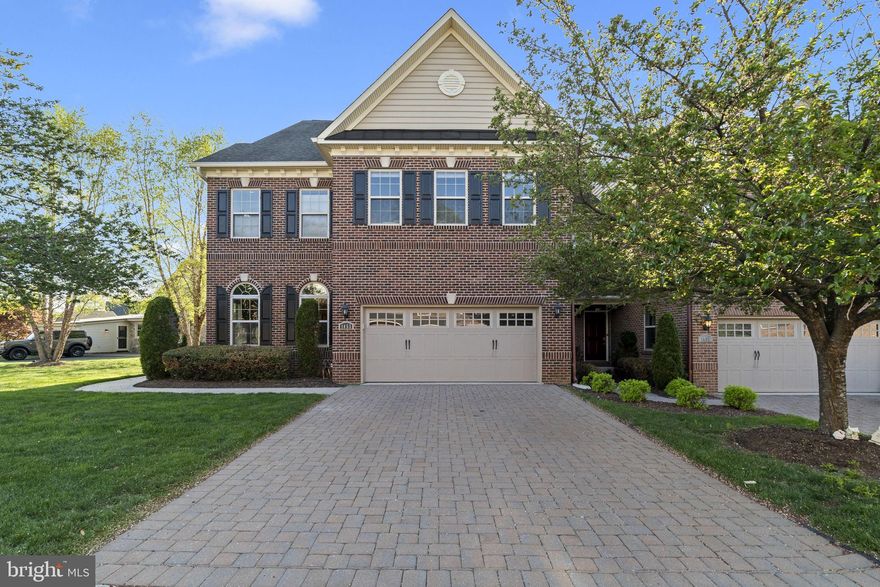 (Showings begin Saturday 4/25) This 3,340-square-foot end-unit colonial home has a comfortable, open feel and plenty of room to live and spread out. One of the nice extras here is the amount of natural light throughout the house; every room feels bright and welcoming. The main level features hardwood floors and a custom kitchen with generous counter space, newer appliances, and a layout that works well for both everyday living and entertaining. You’ll also find a first-floor office, a powder room, and access to the two-car garage, which adds real convenience. Upstairs, the oversized primary suite includes a beautiful bath with a whirlpool tub, large walk-in closet, along with two additional bedrooms and another full bathroom. The finished basement gives you even more usable space, plus another full bath and plenty of storage. Other highlights include a gas fireplace, upper-floor laundry, LED lighting, custom audio throughout, and recently updated HVAC and appliances. Out back, the large deck overlooks open space and enjoys great southern exposure, so the home stays bright throughout the day. The landscaped lot, covered porch, brick and vinyl exterior, two-car garage, and EP Henry driveway all add to the curb appeal. And as a nice bonus, this is one of the few homes in the neighborhood with a view of the original farmhouse, something that gives the property a little extra charm and character. You are also in a very convenient location, within walking distance of shopping, dining, and Core Creek Park is less than two miles away. It is a well-kept home in a neighborhood that makes everyday life easy.