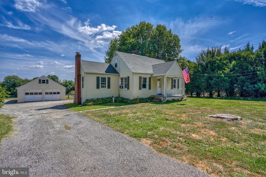 Welcome to this meticulously maintained 3-bedroom, 1.5-bathroom Cape Cod style home, nestled on an expansive lot spanning just under 1 acre. With its classic architecture, detached 2-car garage, and a level landscape that offers endless possibilities, this property is sure to please. 

And if you would like to take advantage of this rare opportunity, the 1 acre lot next door is also being sold by the same owners.  Purchase both as a bundle and you'll have a massive, level, 2 acre lot that you can build on in the future, or simply keep as additional space.