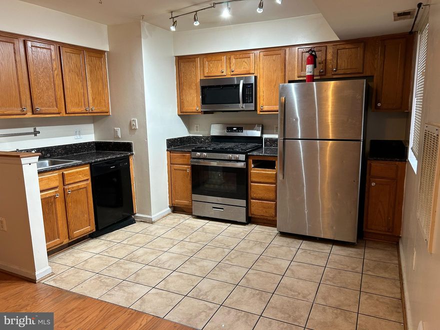 Welcome to this bright, 2 large bedroom, 1 bath condominium, fully renovated kitchen with granite counter top and stainless steel appliances, hardwood floors and access to a private balcony! The condo comes with washer-dryer units, extra storage space, and a parking spot and secured entry. The building is secure in a fenced-in, well-maintained area. You are within walking distance to Deanwood Metro station, 25 restaurants and 3 grocery stores and retail stores. Minutes from Capital Hill and Four Metro stations are nearby: Deanwood and Minnesota Avenue on the Orange Line and Benning Road and Capitol Heights on the Blue and Silver lines. Metrobus’s U4 route runs through the center of the neighborhood, and other lines run along its edges. Capital Bikeshare has a station at the Deanwood Recreation Center and two along Nannie Helen Burroughs Avenue. By car, Deanwood is about 15 minutes from downtown Washington. Very close to shopping, public transportation, and major commuting routes. Walking distance to the park.