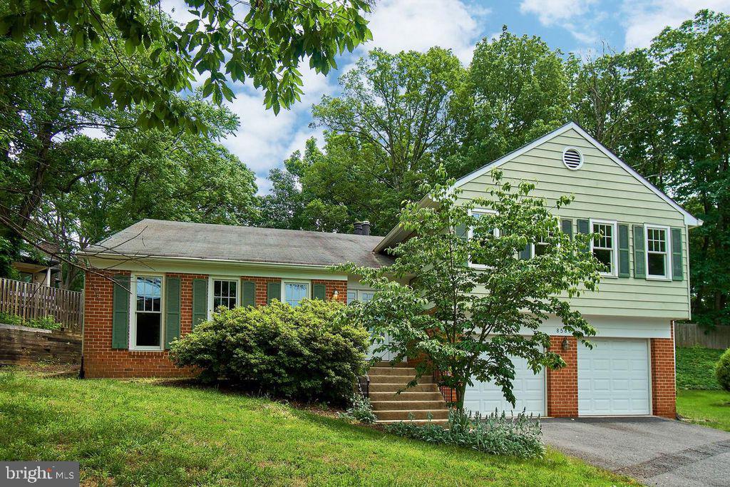 Exquisite Split-Level Home, located on a quiet cul-de-sac and backing to Raglan Road Park, offers an exceptional value. Less than 1 Mile to either the Greensboro & Springhill Silver Line Metro Stations. A large foyer opens to a spacious living room with a vaulted ceiling. The kitchen features a center cooktop island, breakfast bar, and stainless steel appliances, with convenient access to the deck and fenced yard. An adjoining family room, complete with a wood-burning fireplace, also provides access to the deck and yard. The separate dining room overlooks the living area. The master bedroom includes a separate dressing area, three closets, and a private bath with a walk-in shower. All bedrooms are generously sized. The upper hall bath is well-appointed. The lower level boasts a versatile recreation room, a separate den, an additional office/study, a dedicated laundry room, and a full bath. Ample storage is available with a large storage room and a crawl space. The home features gleaming hardwood floors throughout and plush carpeting, This home is just minutes from Tysons Corner, offering abundant shopping, dining, schools, and transportation options. Comes with Solar Power to offset your Electricity Costs. Note: Photos From Pevious Listing.